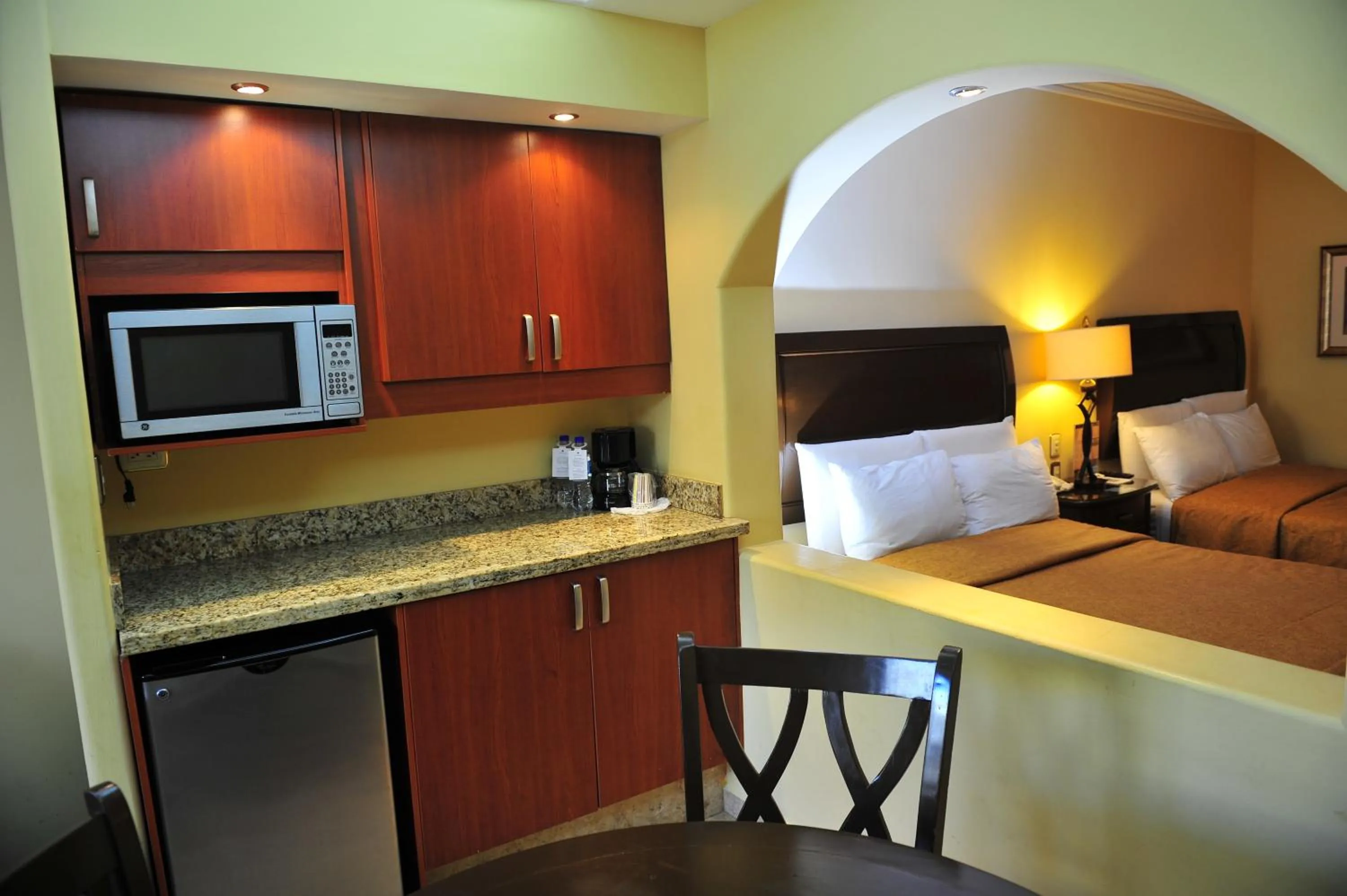 Kitchen or kitchenette, Bed in Hotel San Sebastian