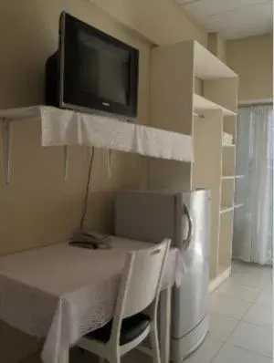 Photo of the whole room, TV/Entertainment Center in Chomdao Hotel