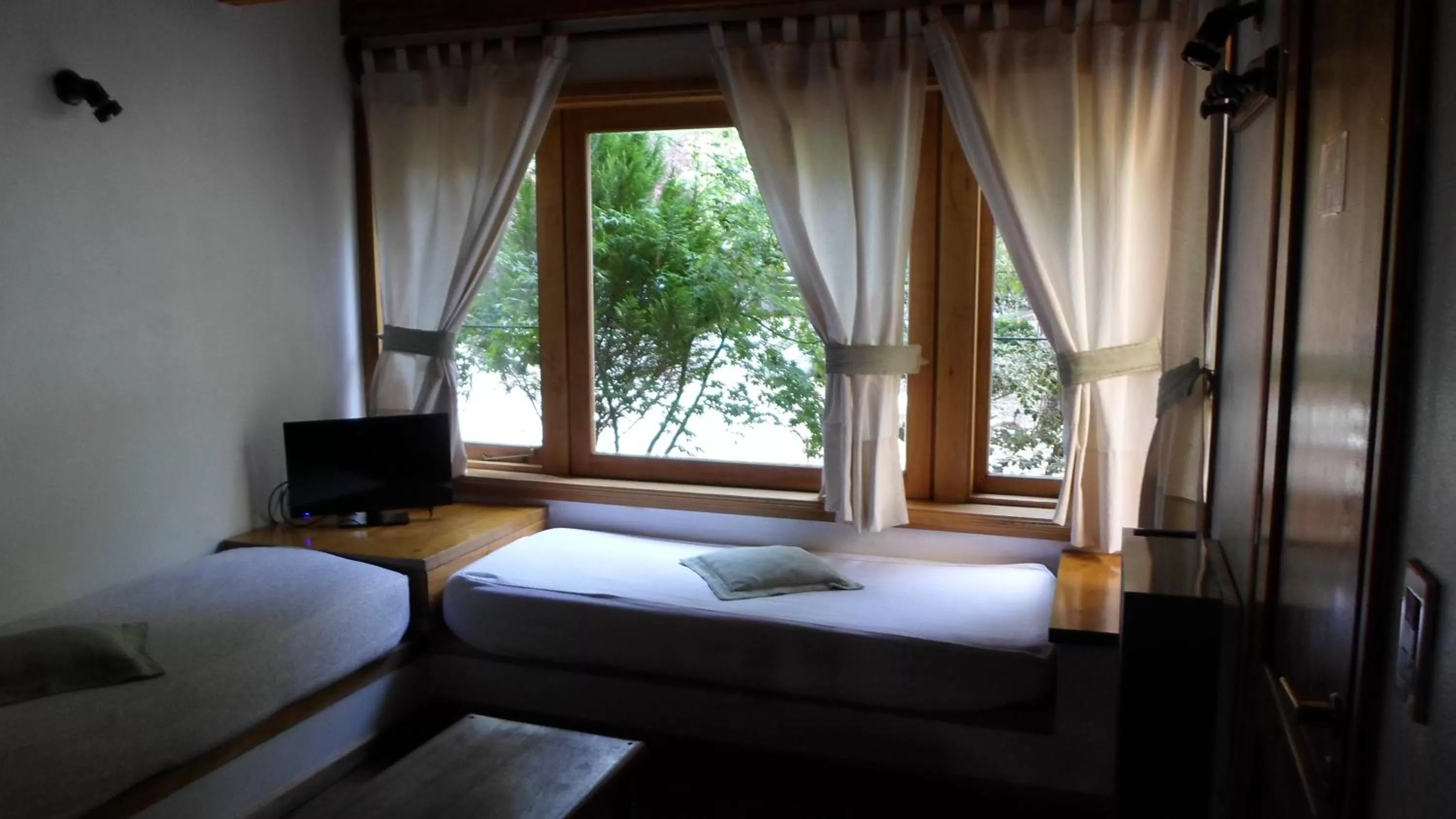 Living room, Bed in Apart Hotel Robles del Sur