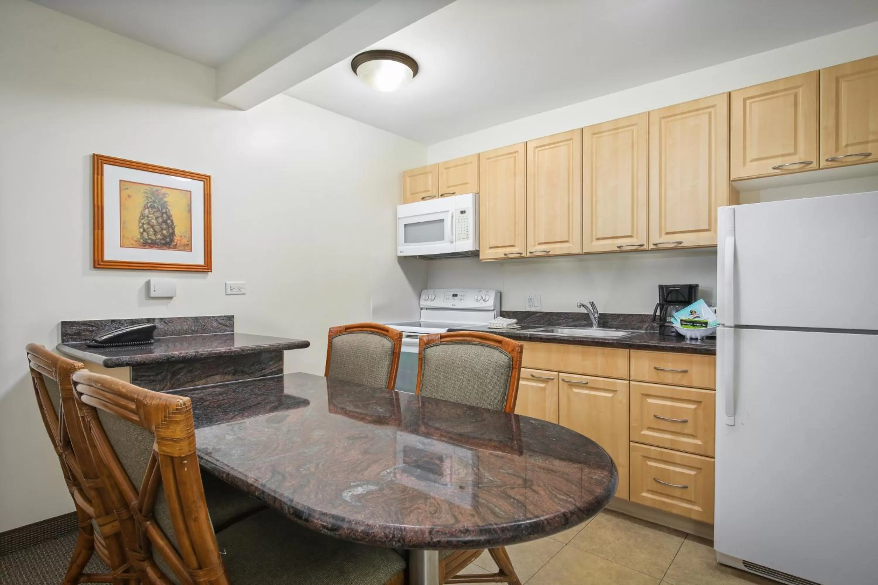 Kitchen or kitchenette in Aston Waikiki Sunset