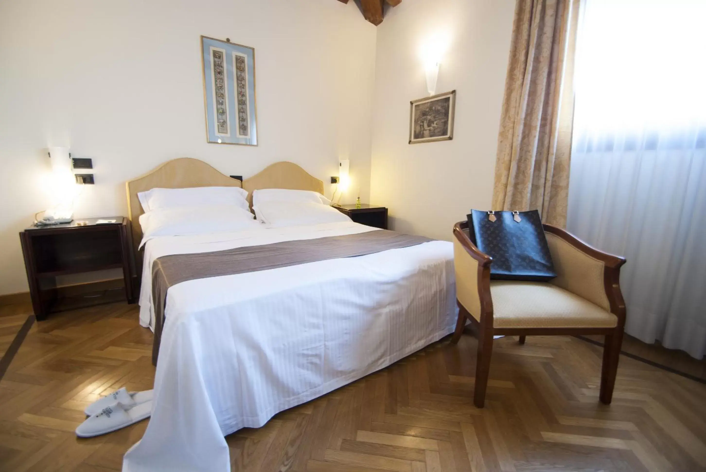 Bed in Alla Rocca Hotel Conference & Restaurant