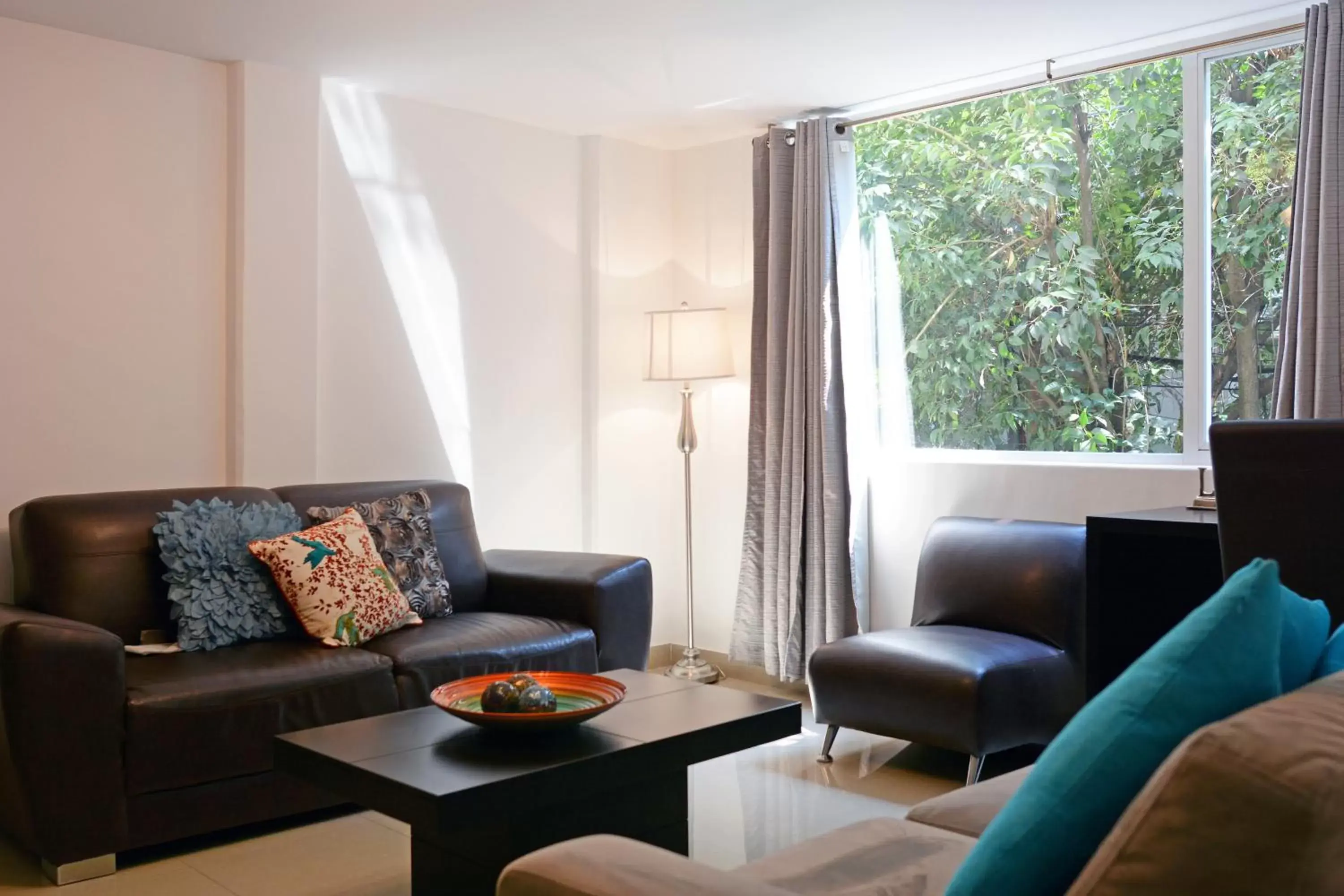 Living room, Seating Area in Suites 259 Condesa