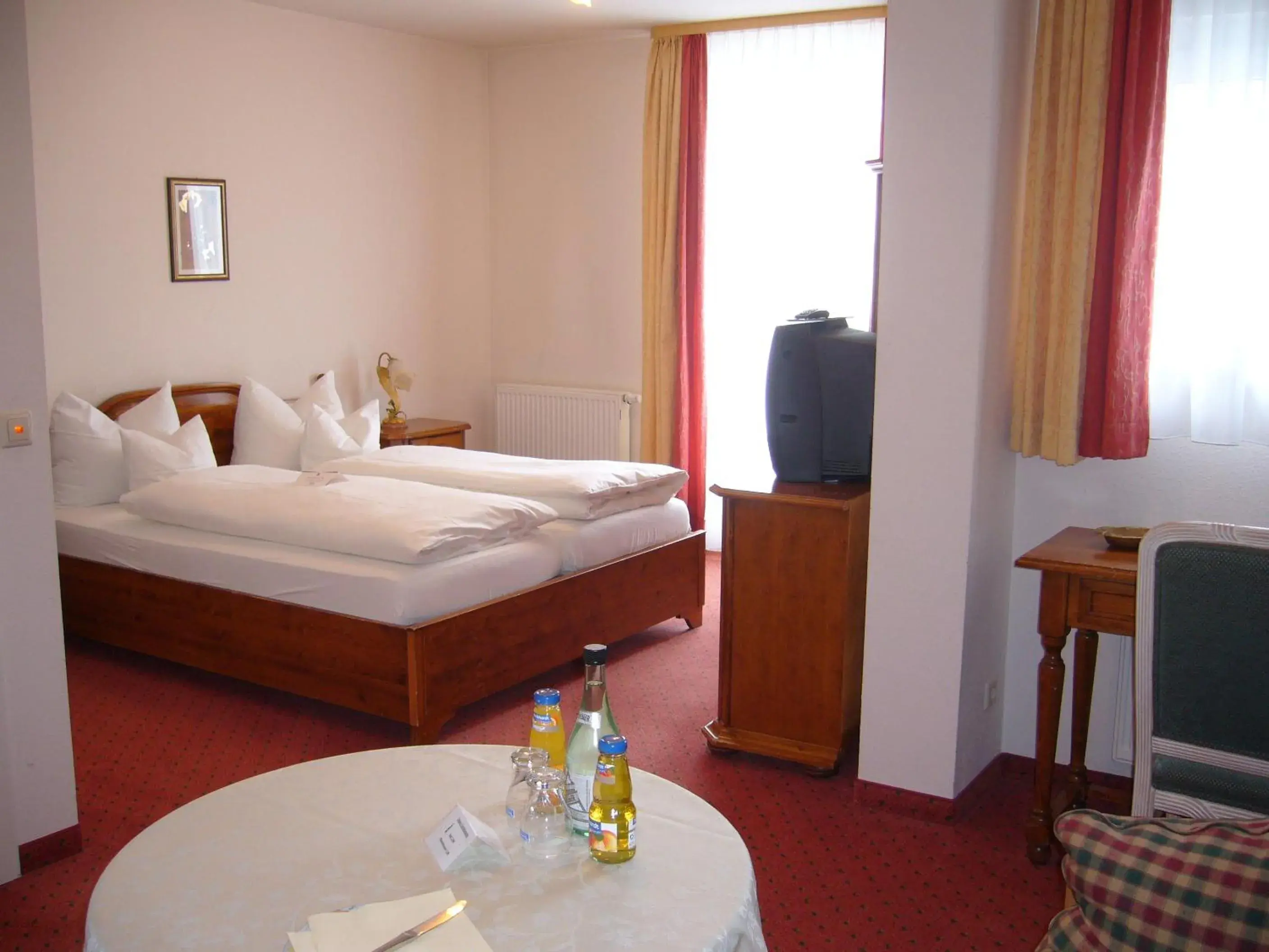 Photo of the whole room, Bed in Flair Hotel Vier Jahreszeiten