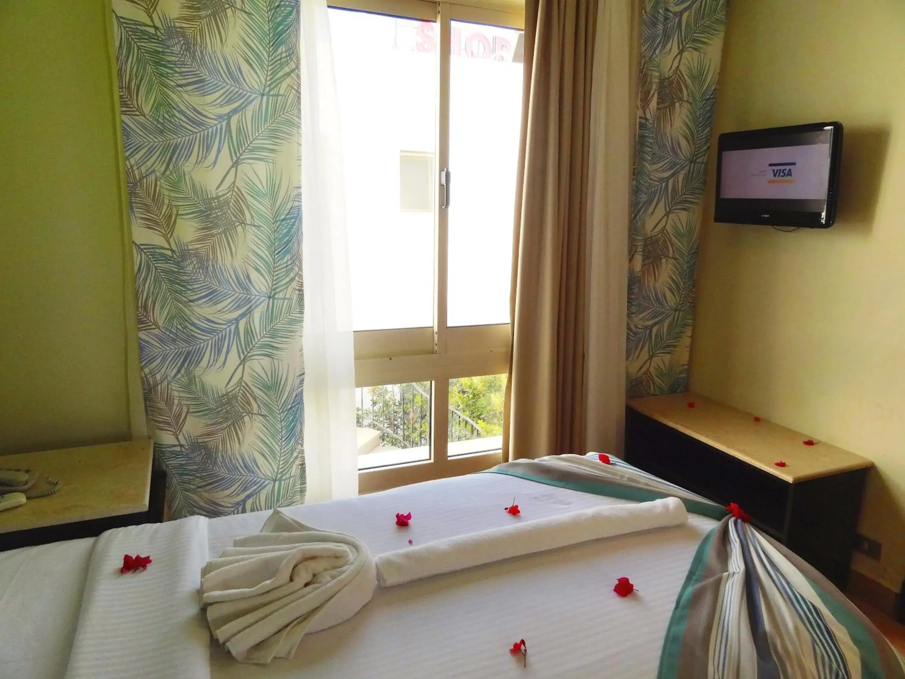 Photo of the whole room, Bed in Naama Blue Hotel Photo of the whole room, Bed in Naama Blue Hotel