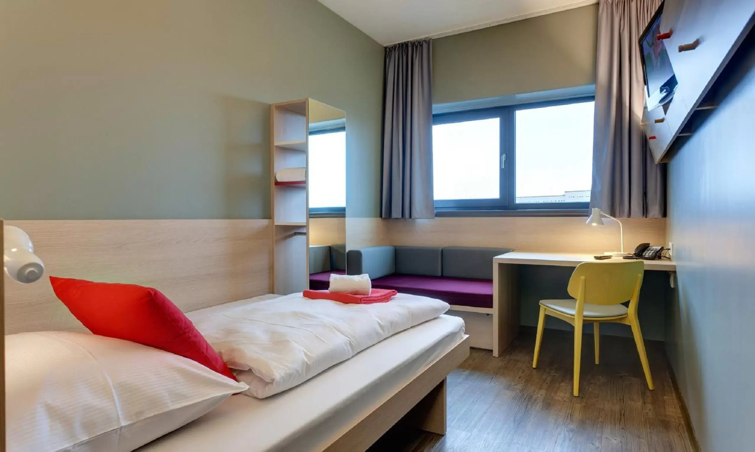 Bedroom, Bed in MEININGER Hotel Berlin Airport