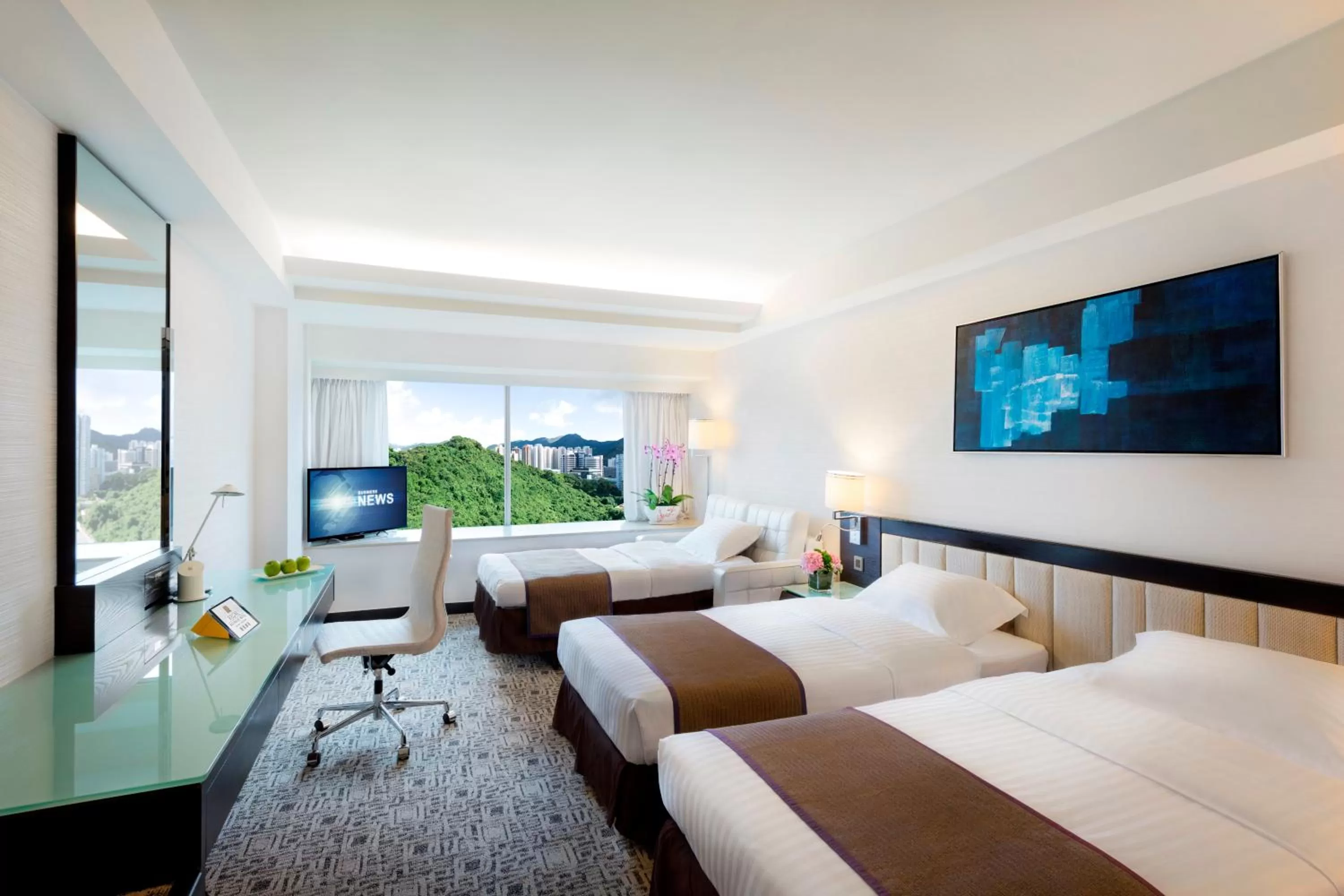 Bed in Regal Riverside Hotel