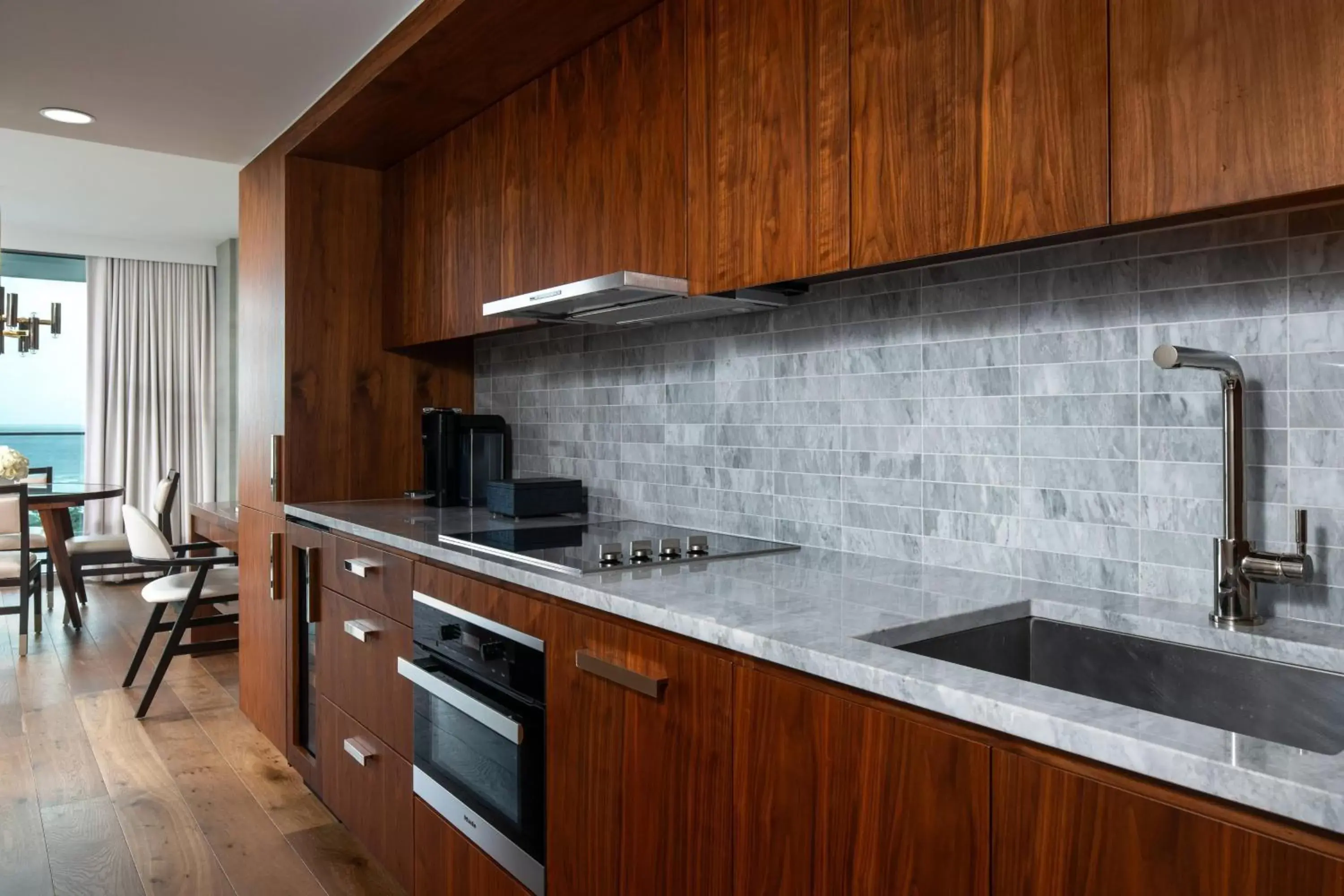 Bedroom, Kitchen/Kitchenette in The Ritz-Carlton Residences, Waikiki Beach Hotel