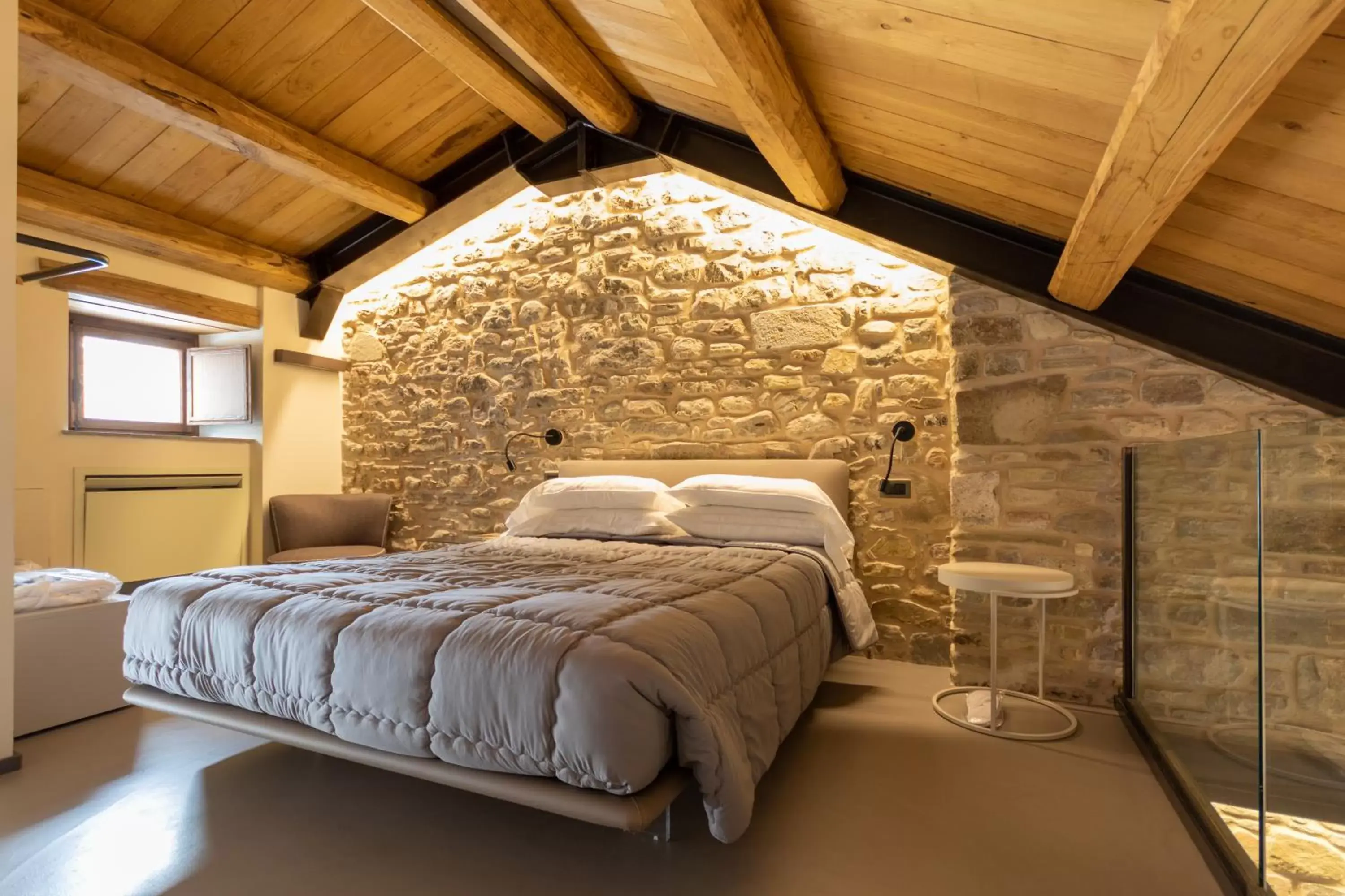 Photo of the whole room, Bed in Borgotufi Albergo Diffuso