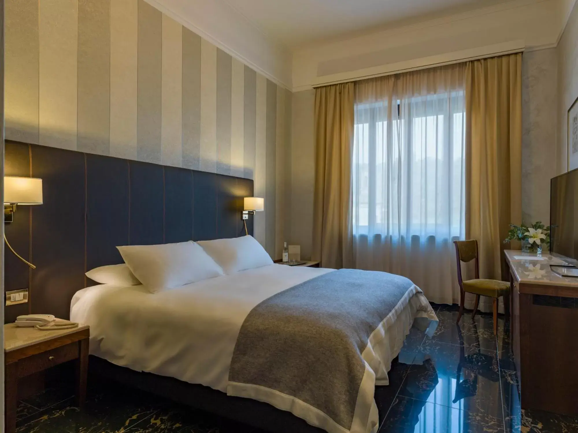 Bed in Grand Hotel Castrocaro Longlife Formula