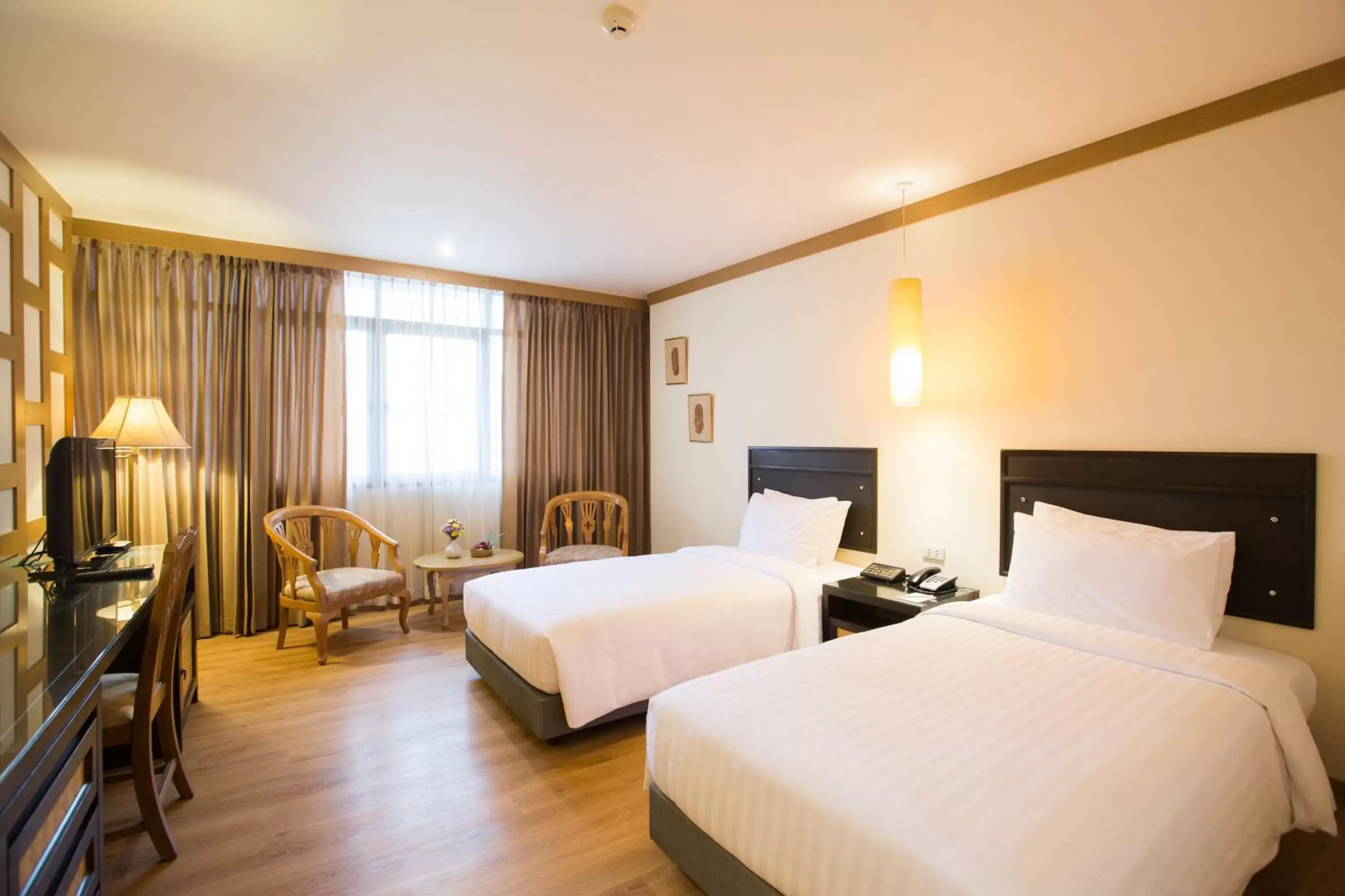 Bed in The Tarntawan Hotel Surawong Bangkok