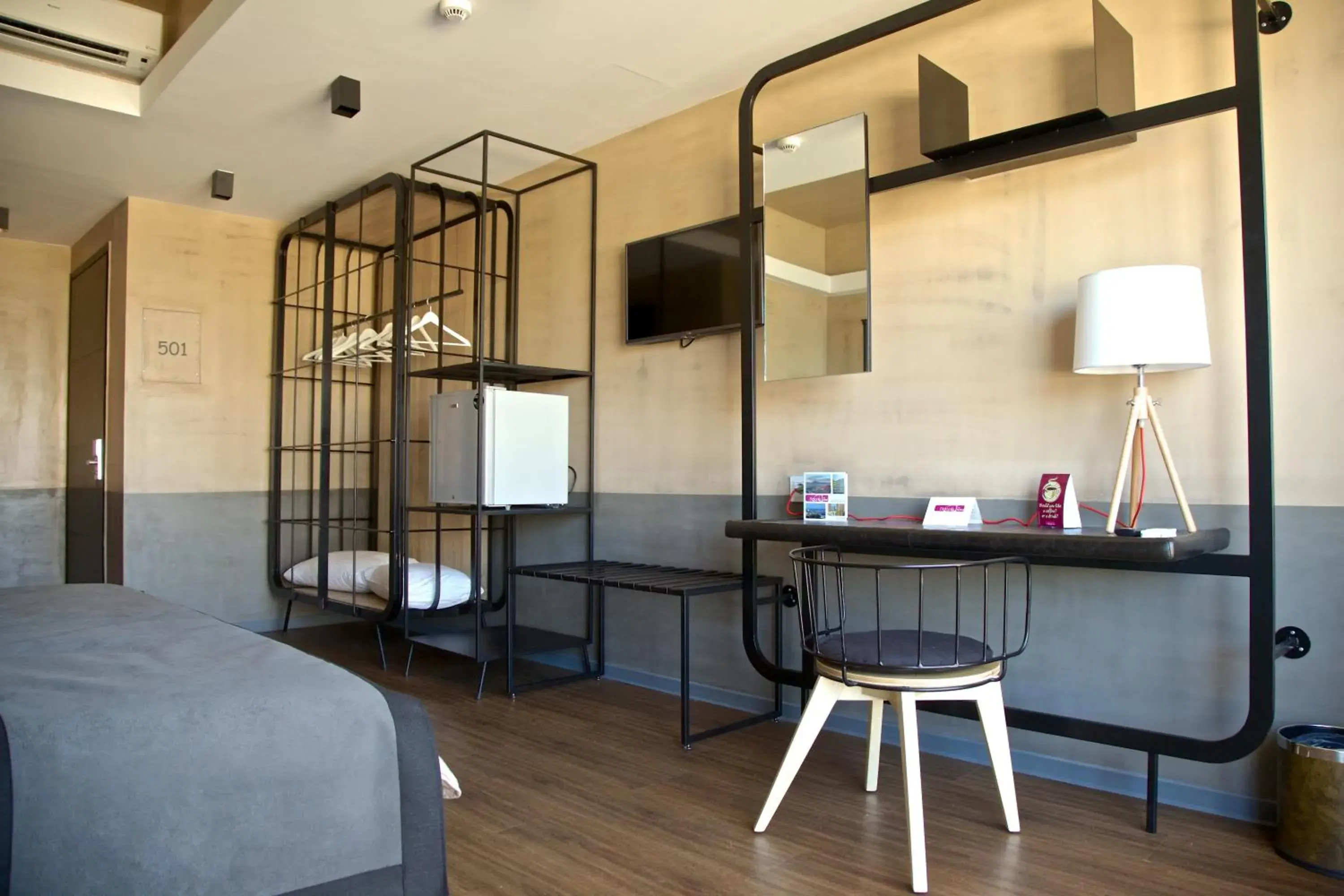 Bedroom in Adonis City Hotel
