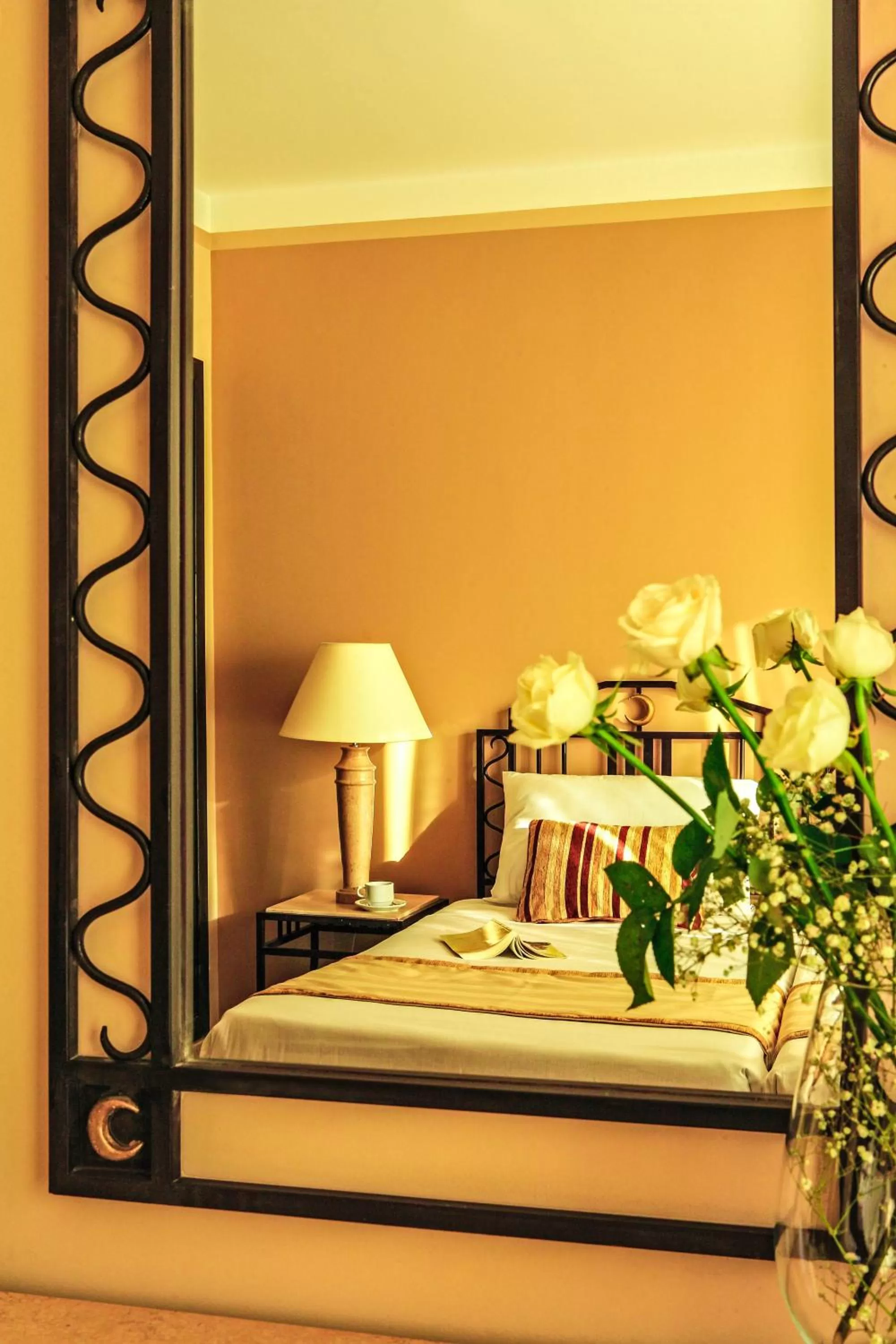 Decorative detail, Bed in Solymar Ivory Suites