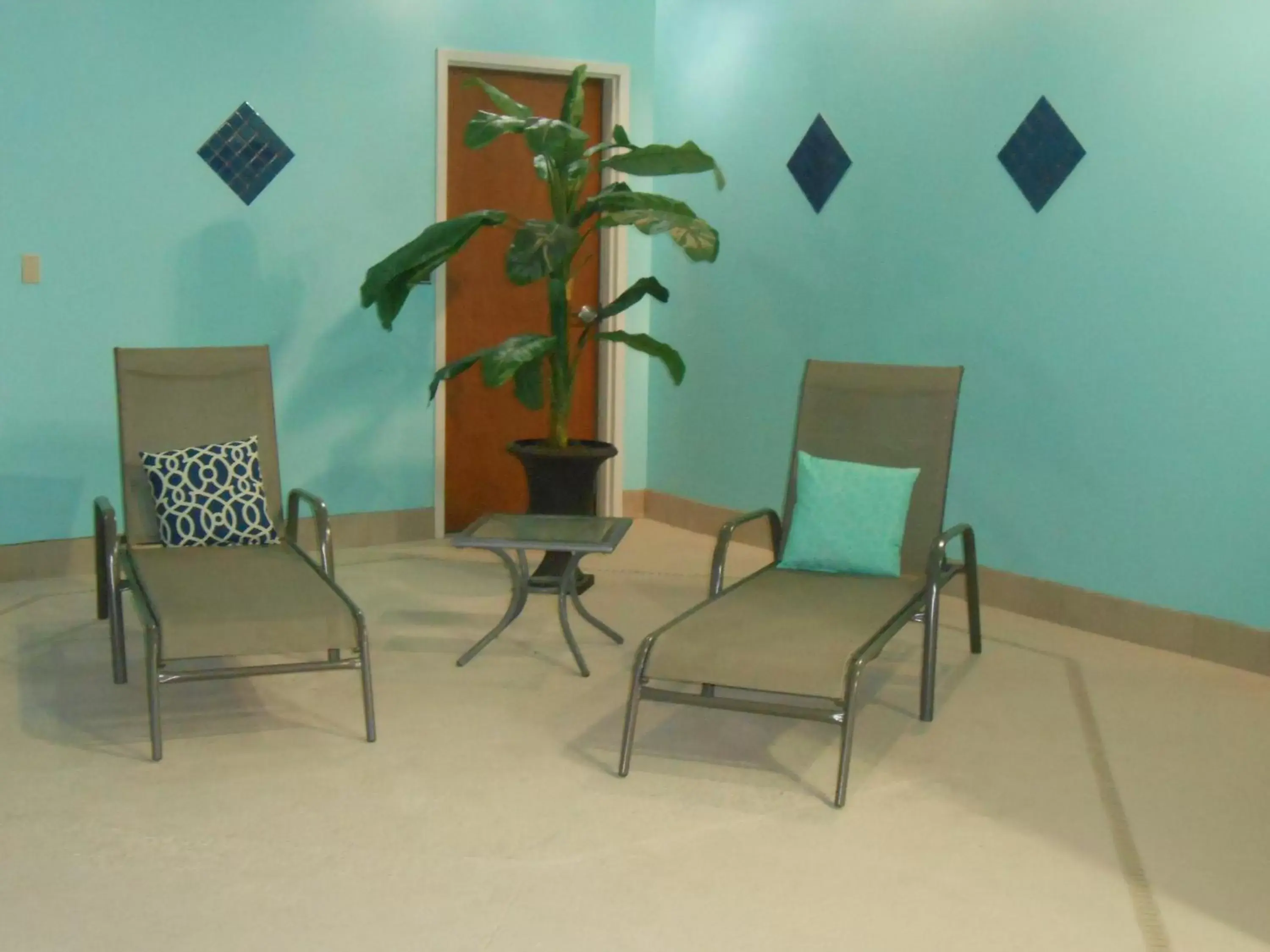 Swimming pool, Seating Area in Holiday Inn Carbondale - Conference Center, an IHG Hotel