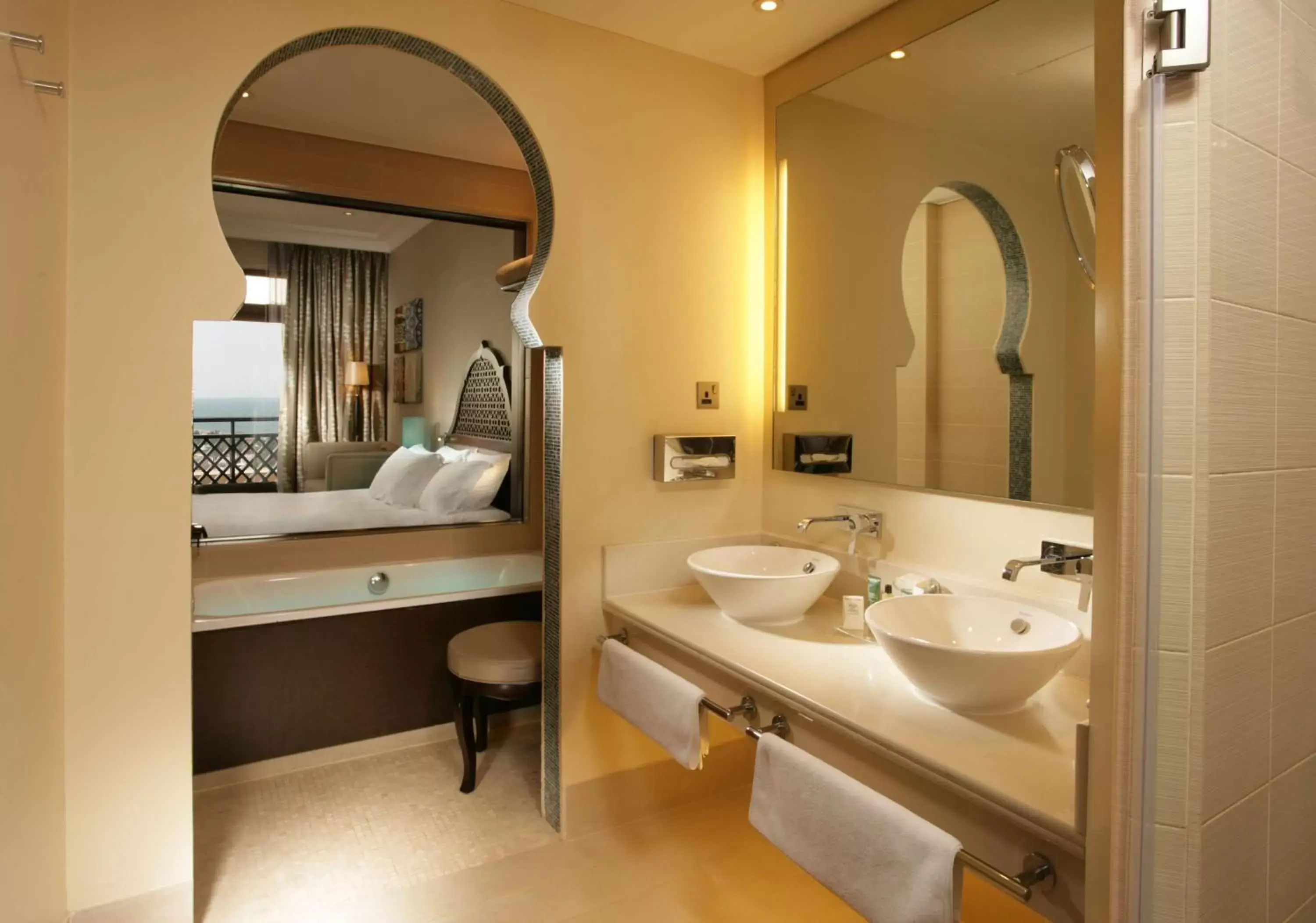 Bed, Bathroom in Hilton Ras Al Khaimah Beach Resort