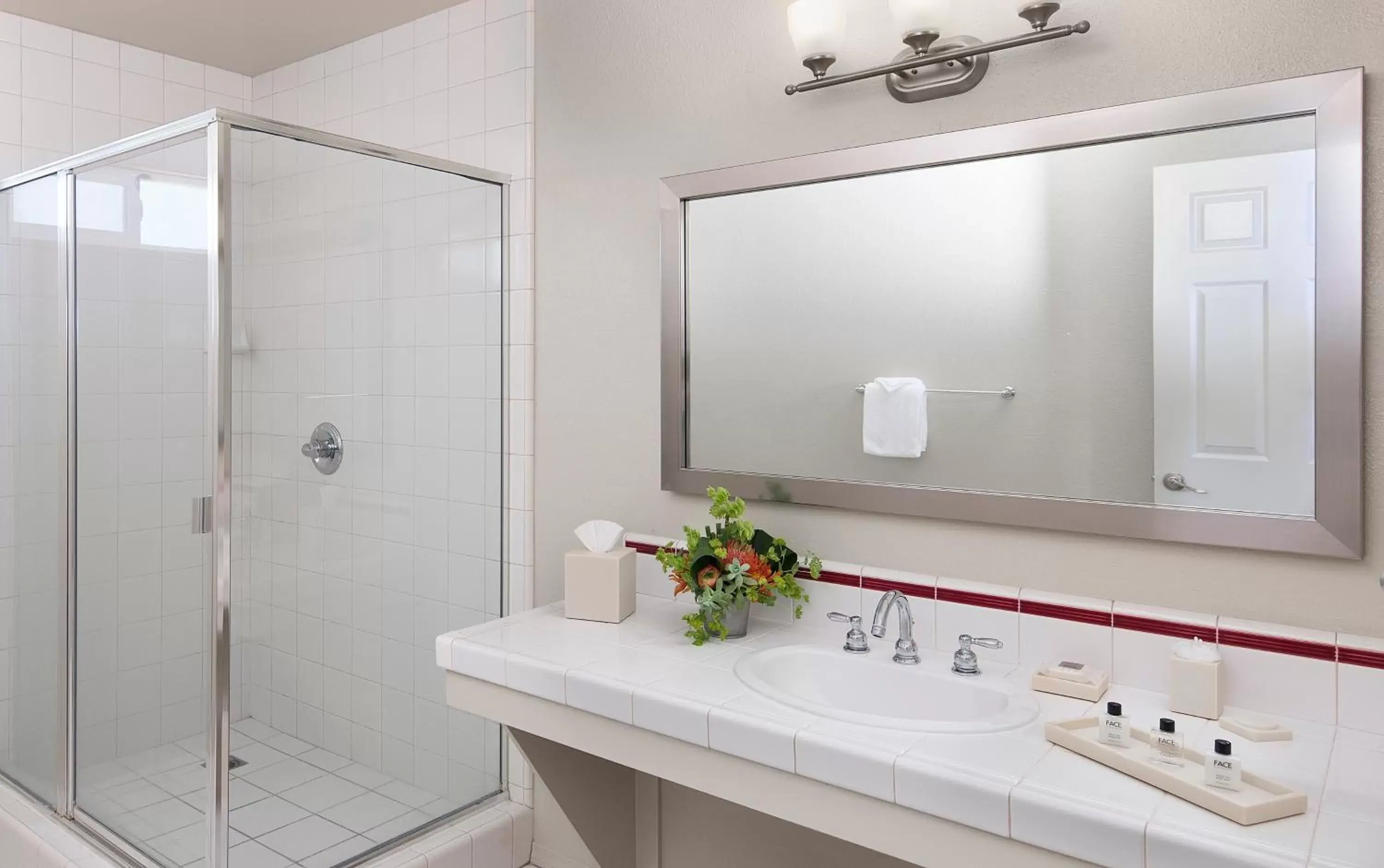 Bathroom in Cambria Landing Inn and Suites