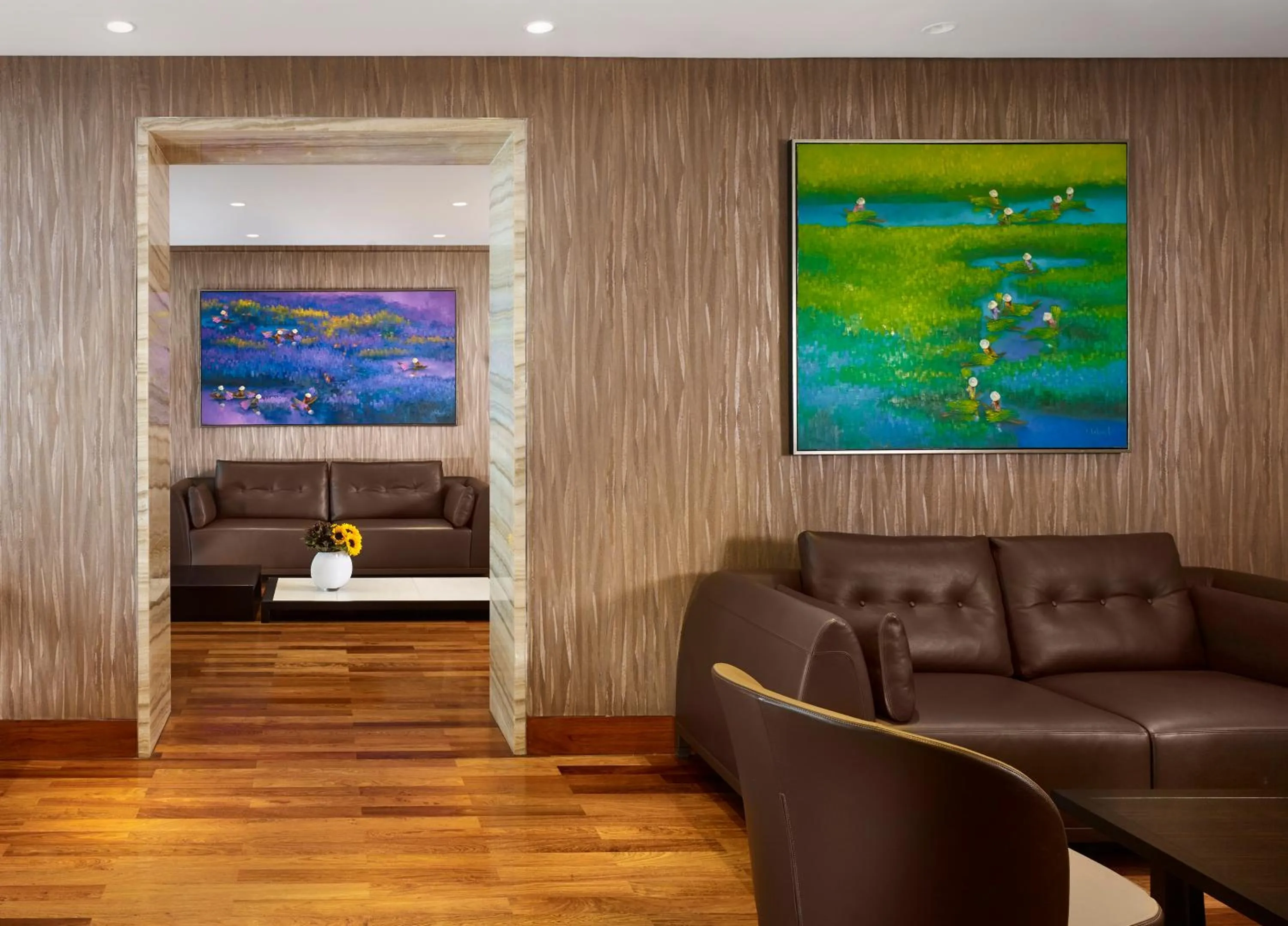 Communal lounge/ TV room in The Reverie Saigon Residential Suites