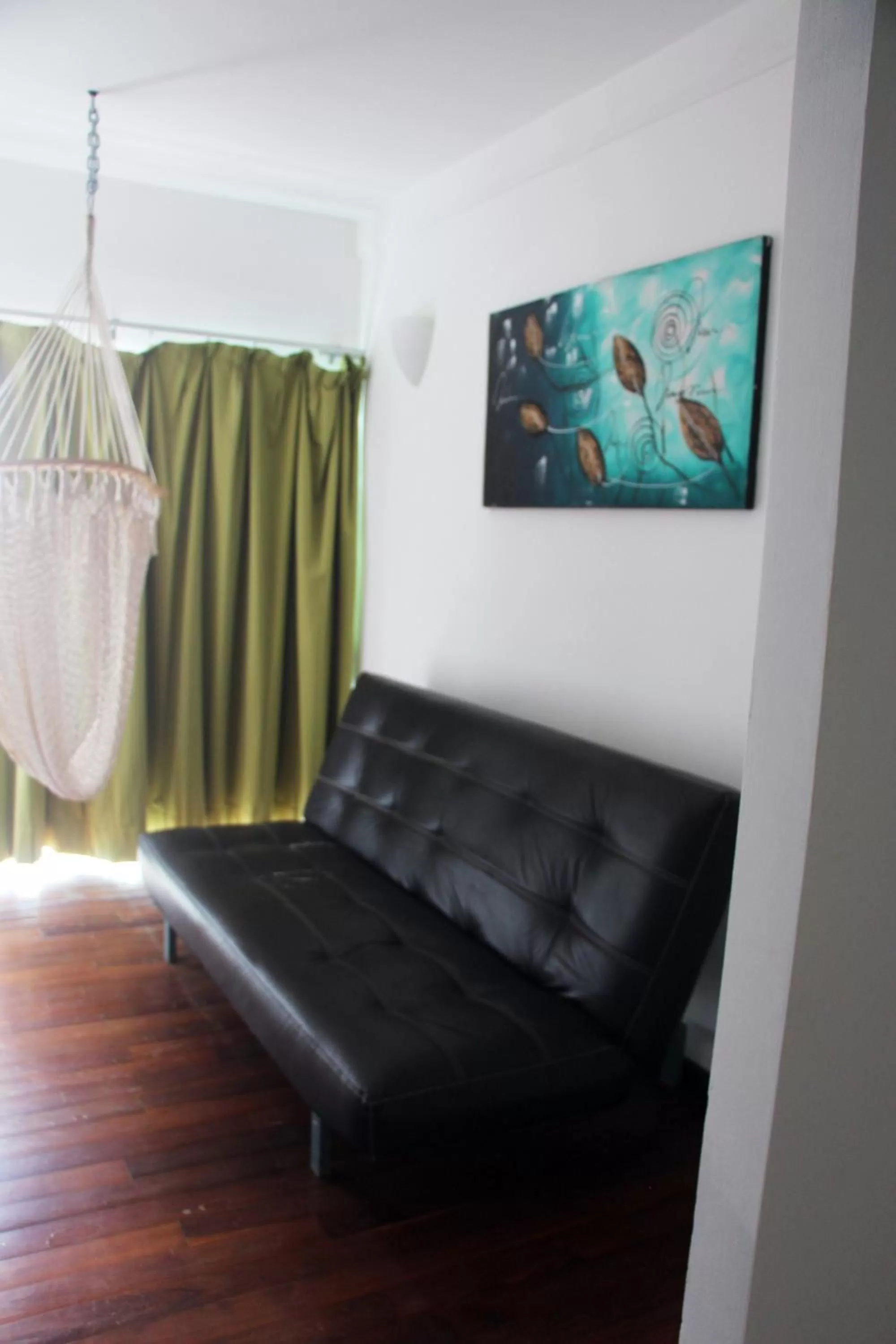 Photo of the whole room, Seating Area in Hotel & Hostal Casa de Luz Cancun