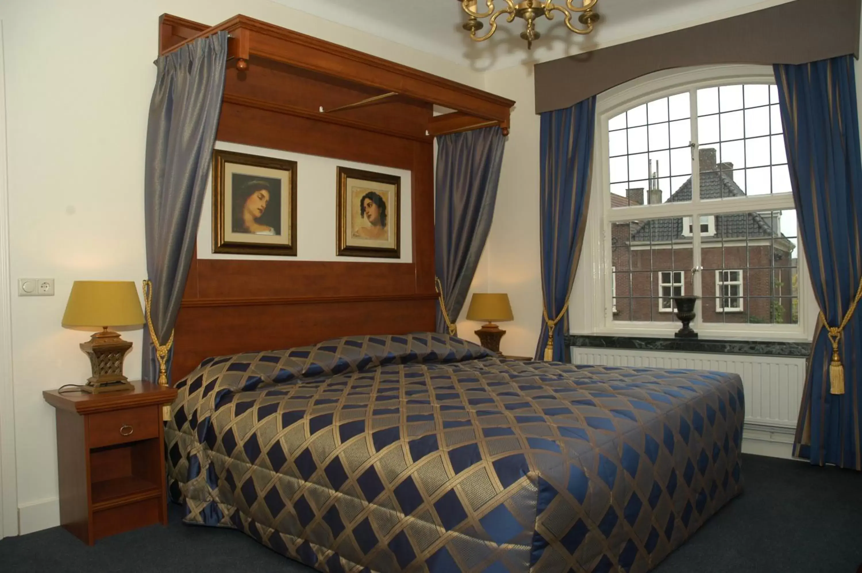 Bed in Hotel De Kroon Gennep
