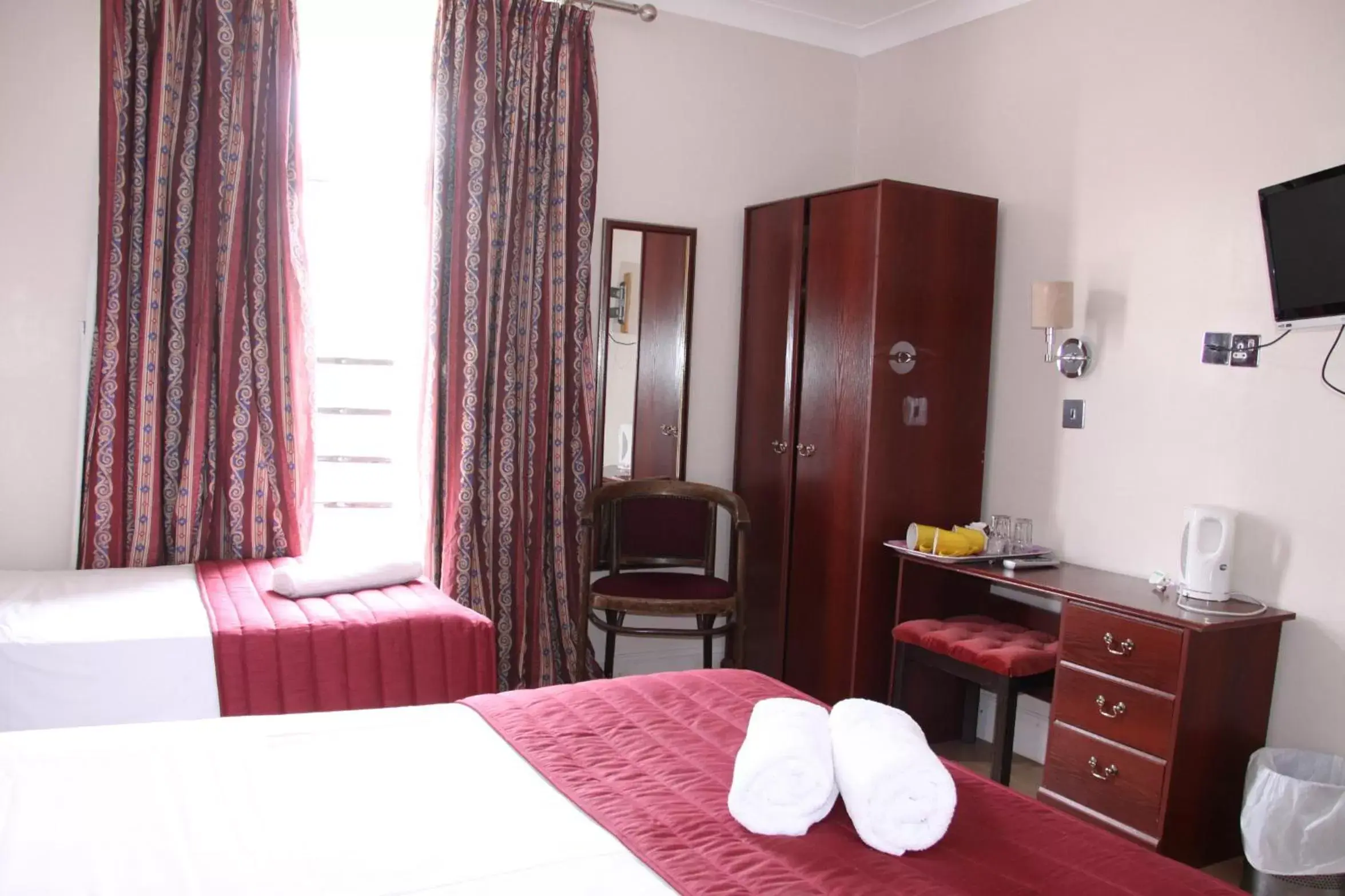 Bed in Ambassador Hotel Bed in Ambassador Hotel