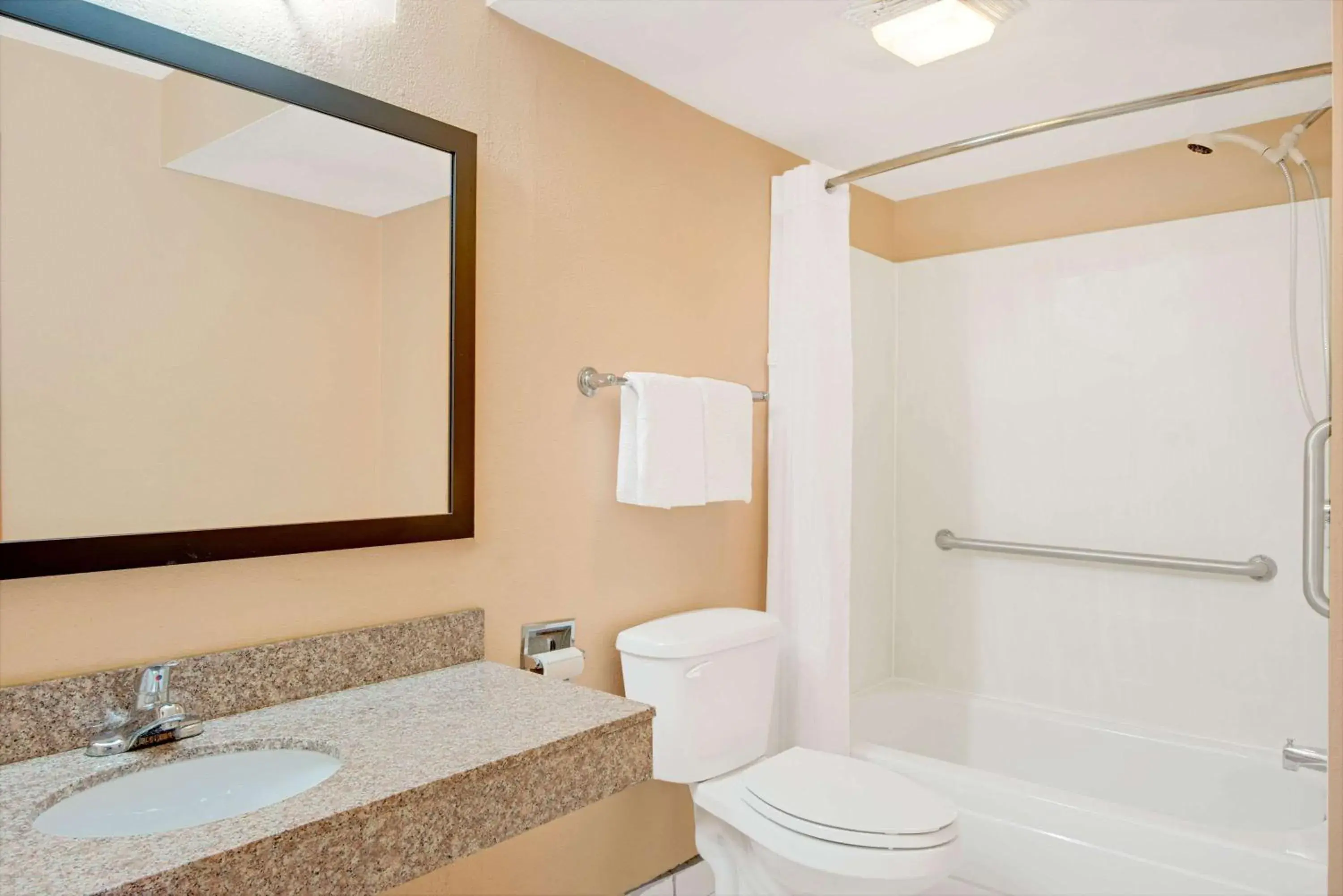 Bathroom in Days Inn by Wyndham Independence