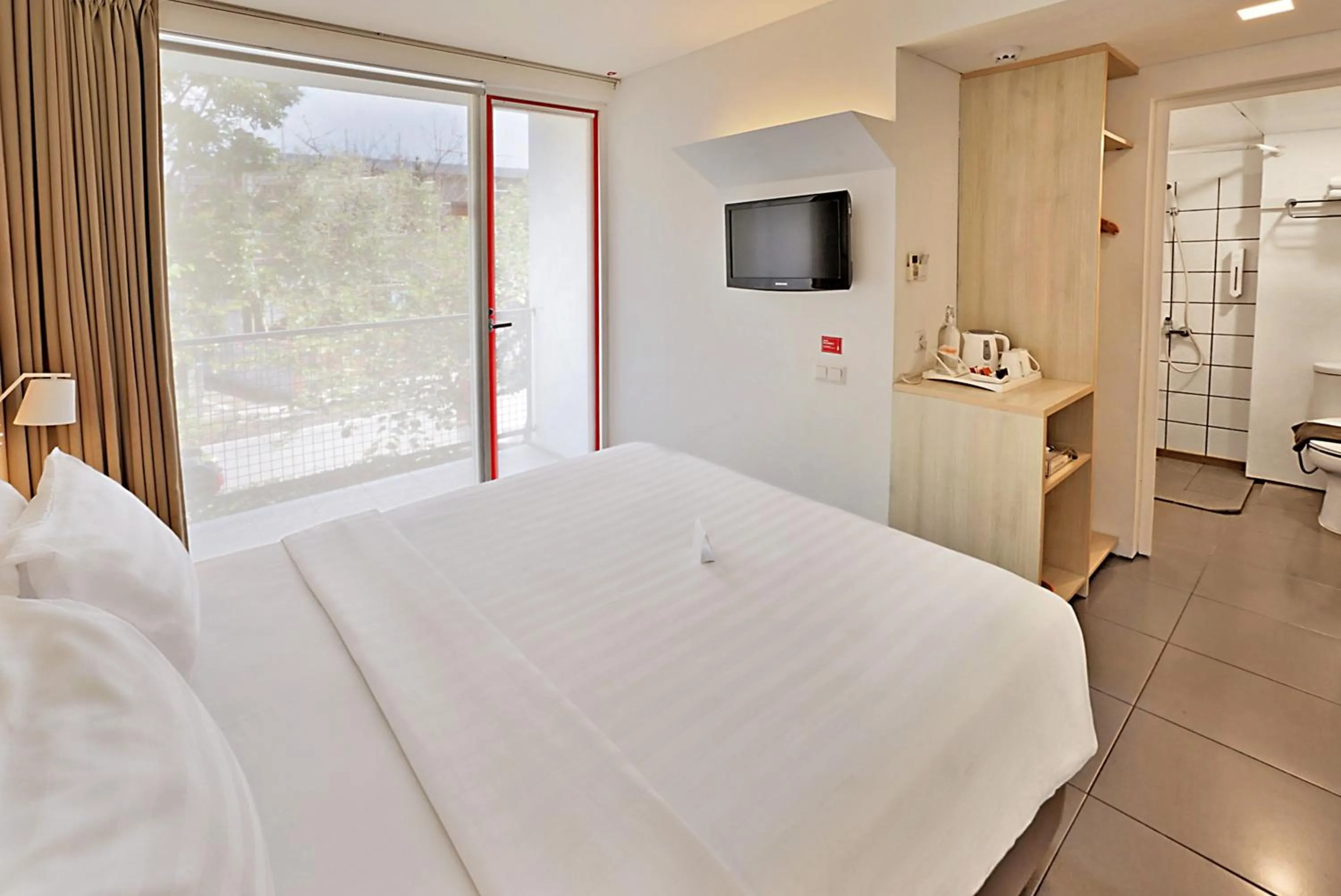 Bed in Malaka Hotel Bandung