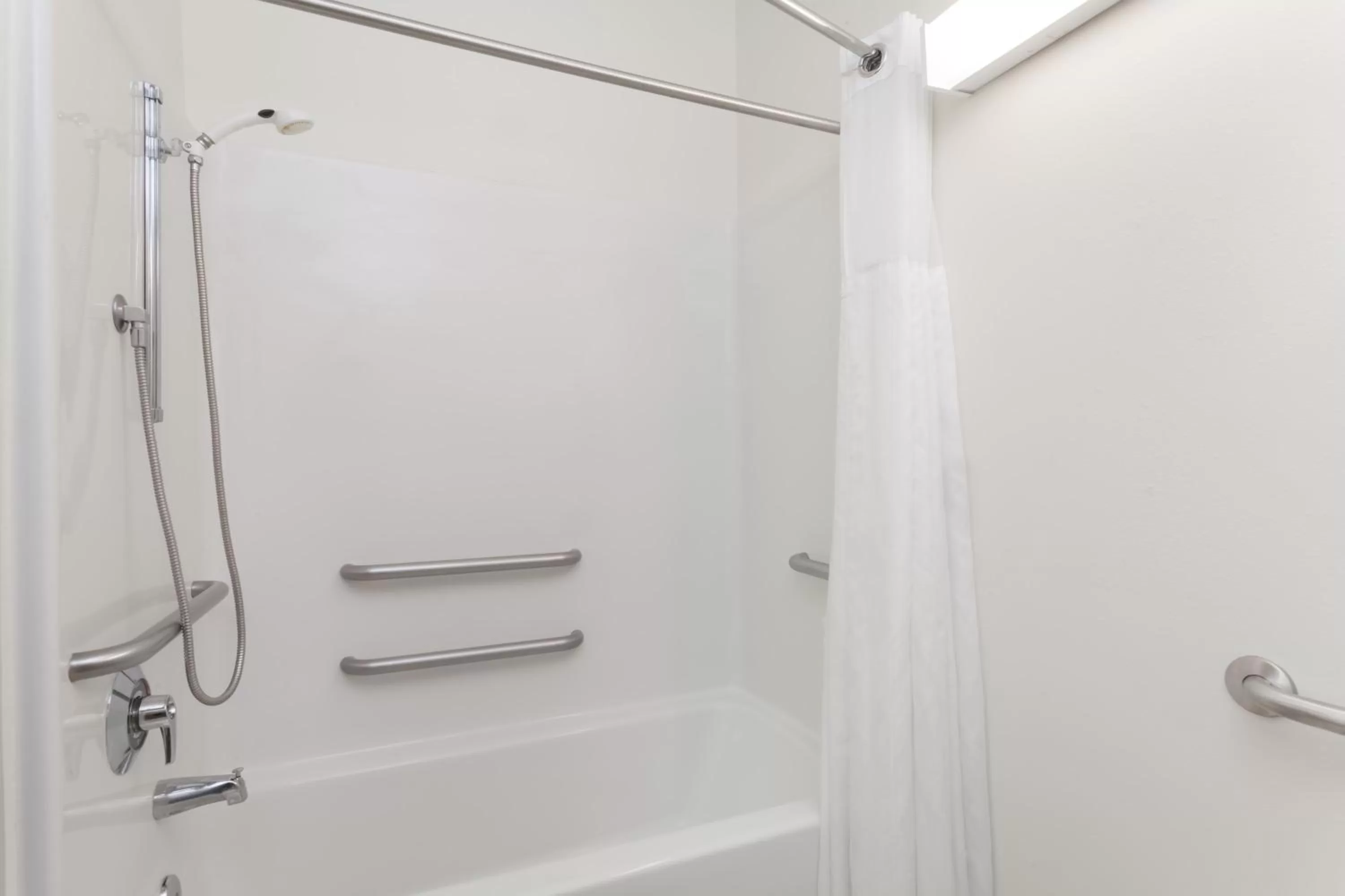 Shower in Days Inn & Suites by Wyndham Cambridge
