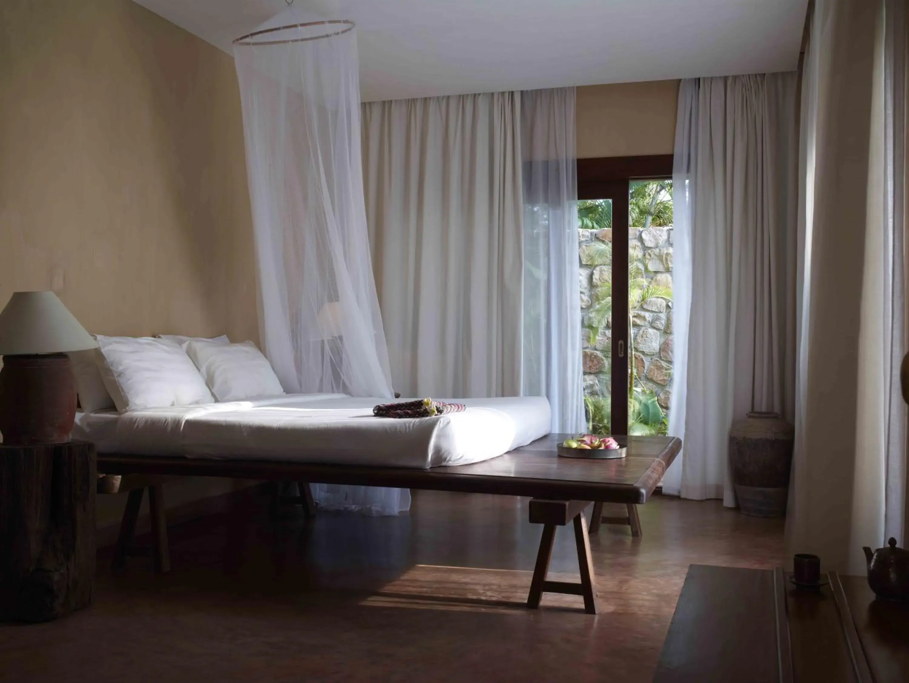 Bed in Knai Bang Chatt Resort Bed in Knai Bang Chatt Resort