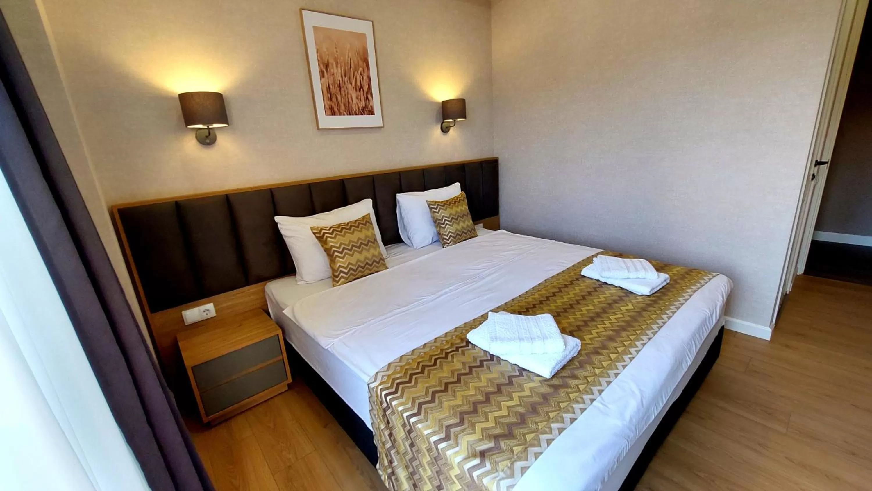 Bed in Falcon Boutique Hotel