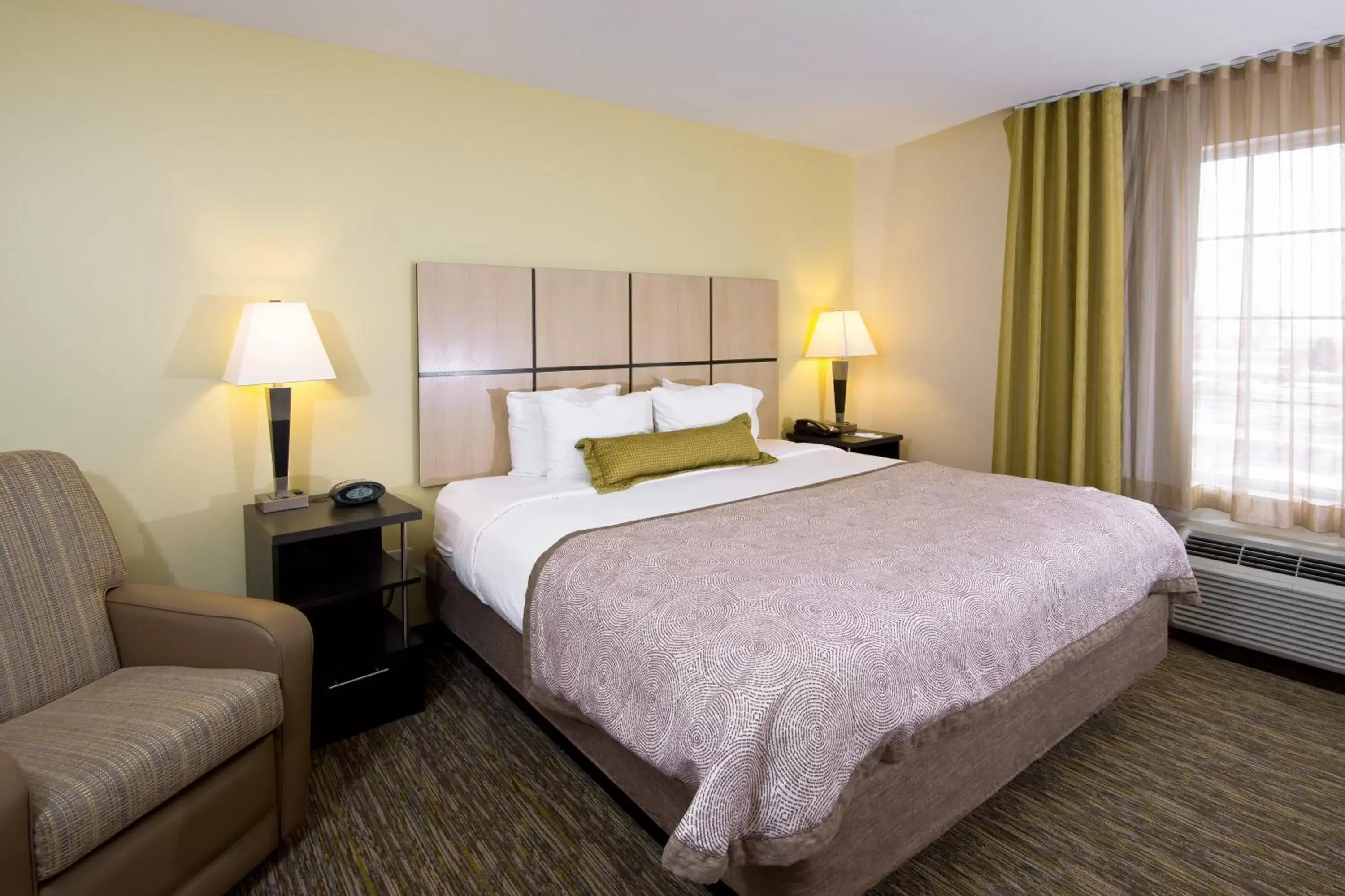 Photo of the whole room, Bed in Candlewood Suites Greeley, an IHG Hotel