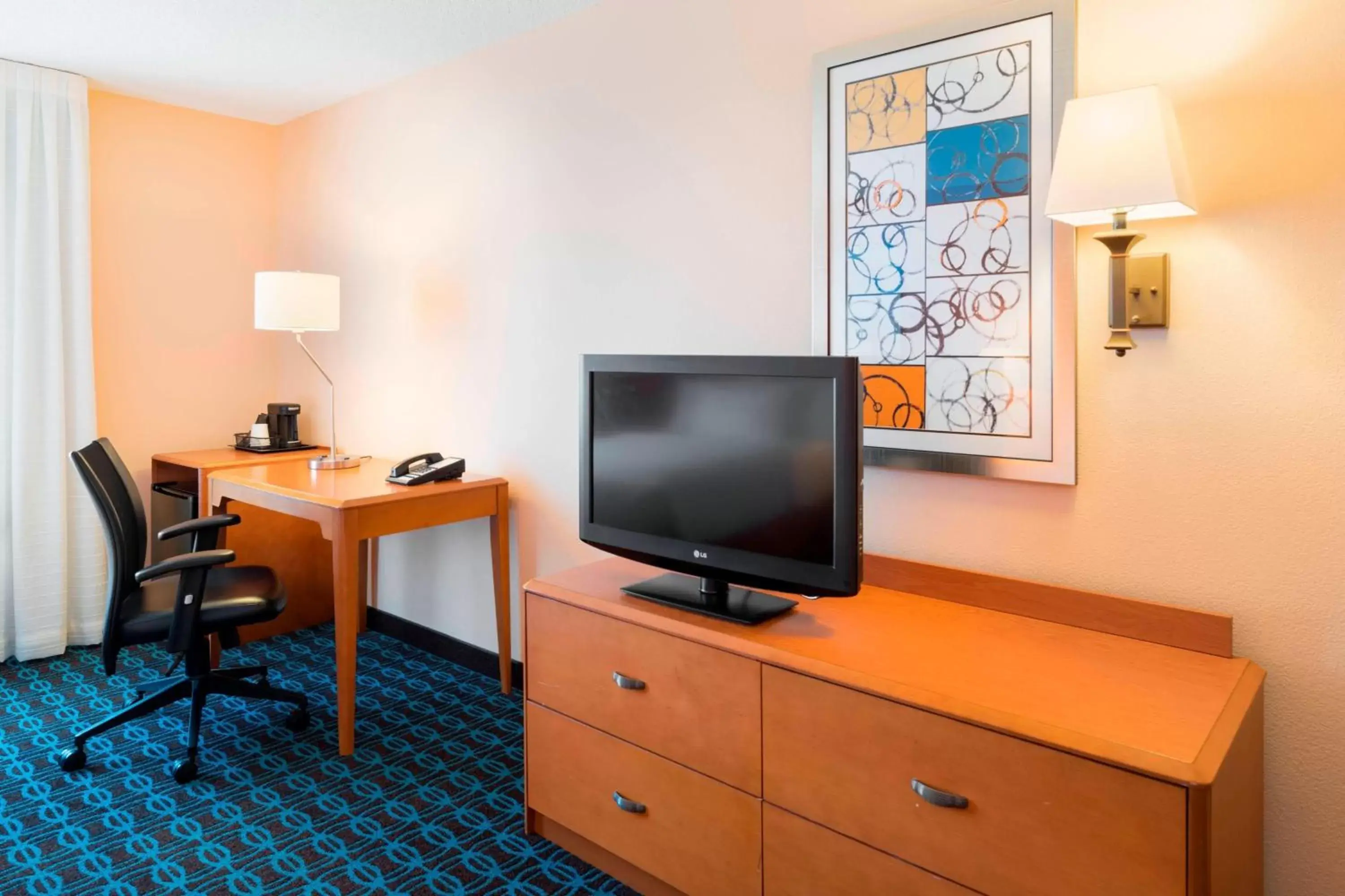 Photo of the whole room, TV/Entertainment Center in Fairfield Inn & Suites by Marriott State College