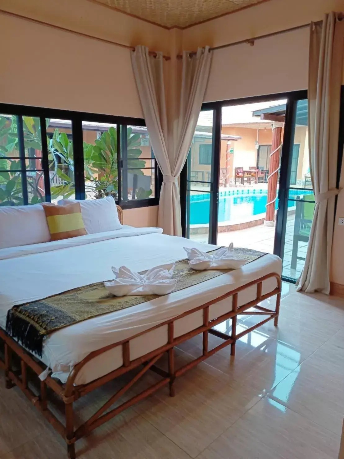 Bed, Dining Area in Panisara Pool Villa Resort Huahin