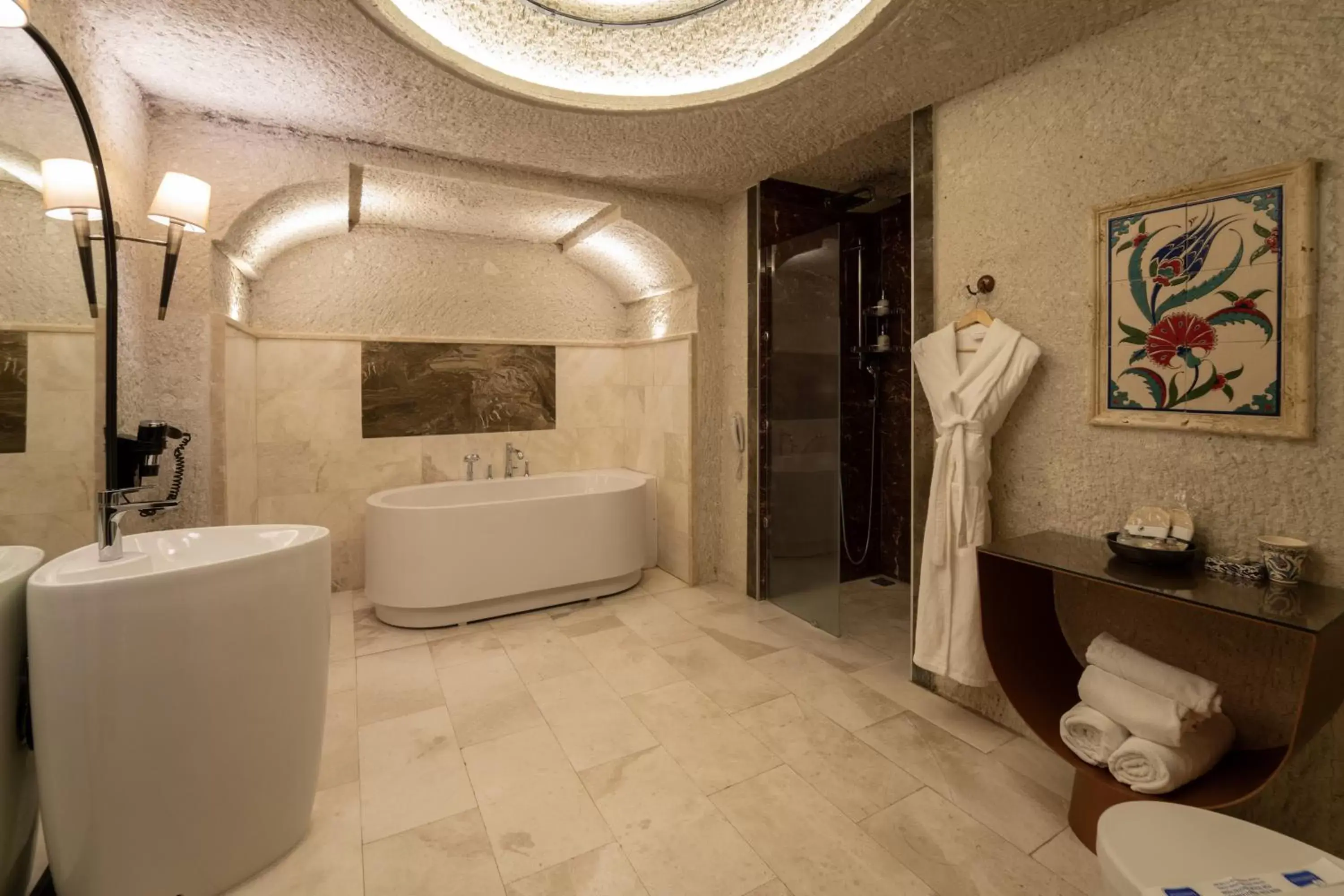 Bathroom in Artemis Cave Suites & Spa- Adults Only