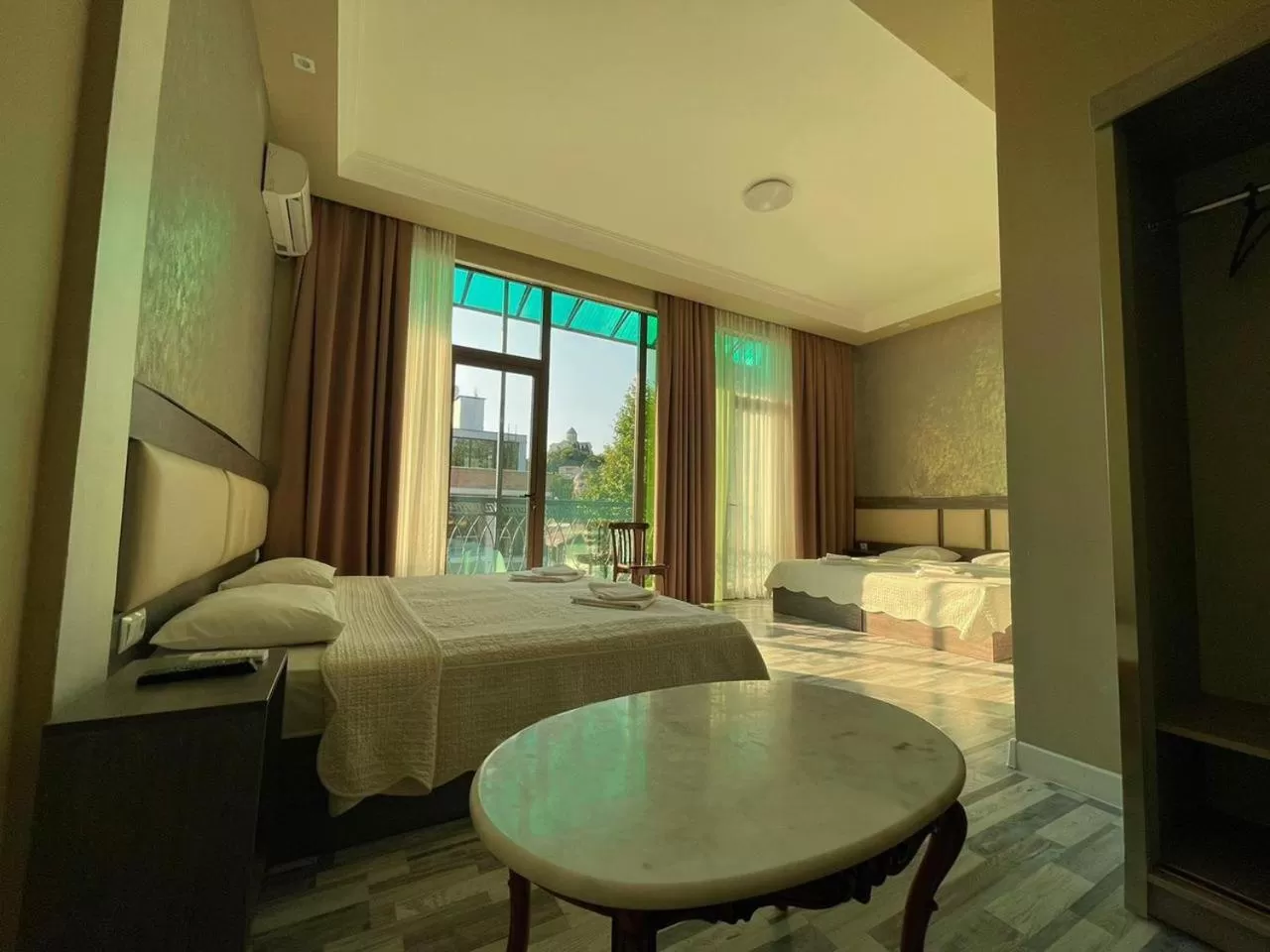 Photo of the whole room, Bed in Discovery Hotel