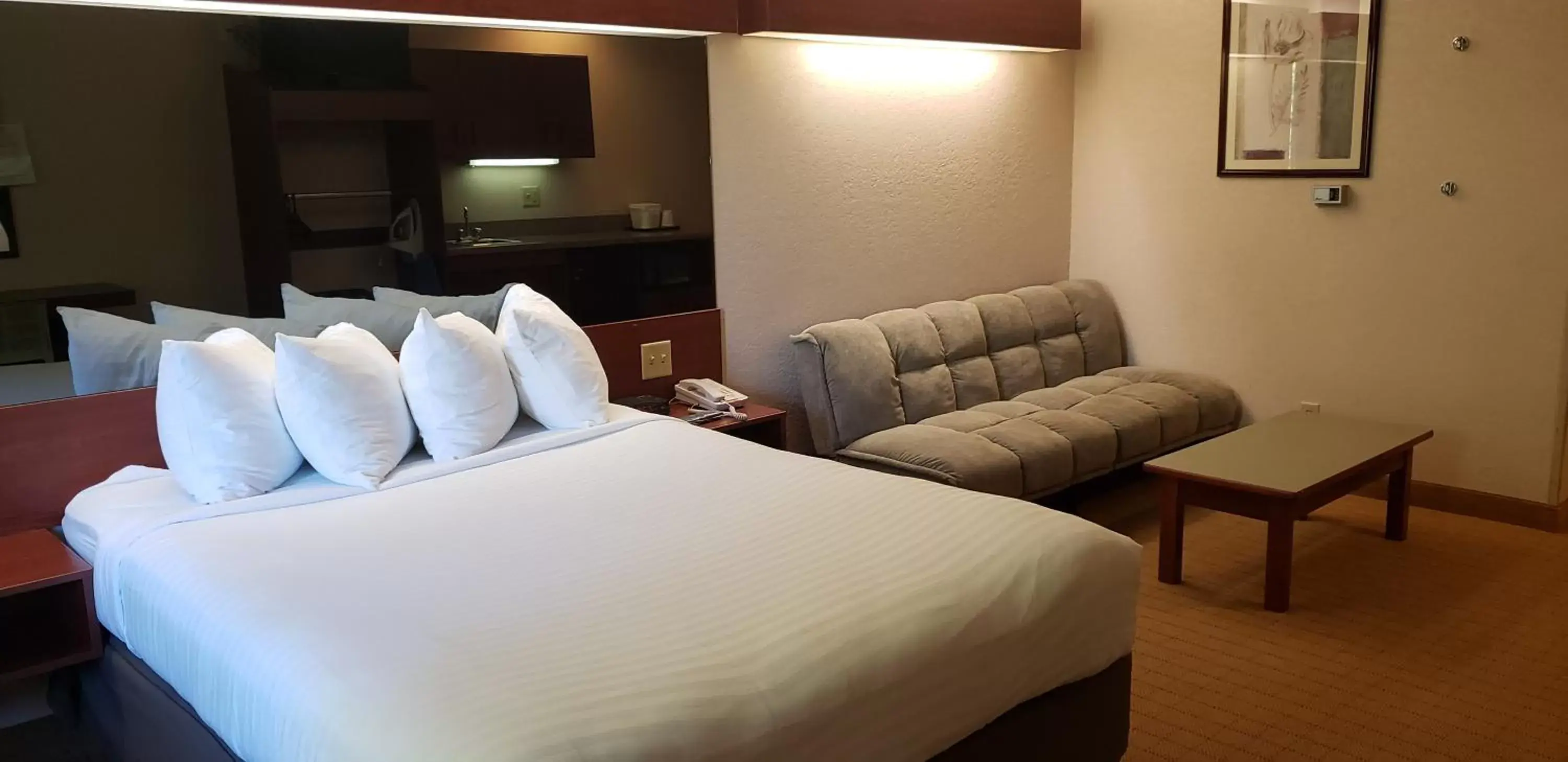 Bed in Microtel Inn & Suites by Wyndham Wellsville