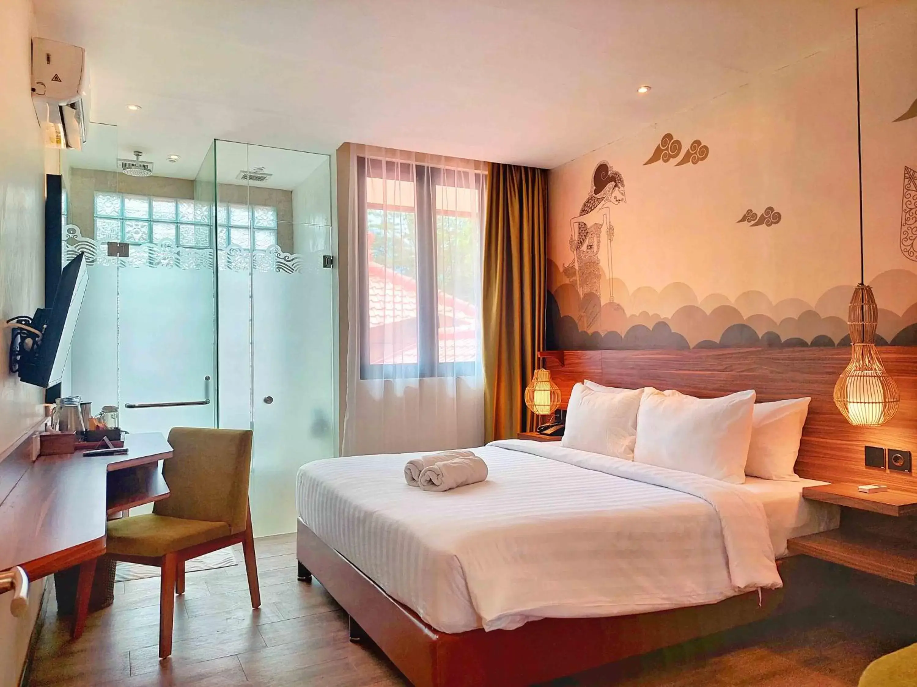 Bed in The Batu Hotel & Villas