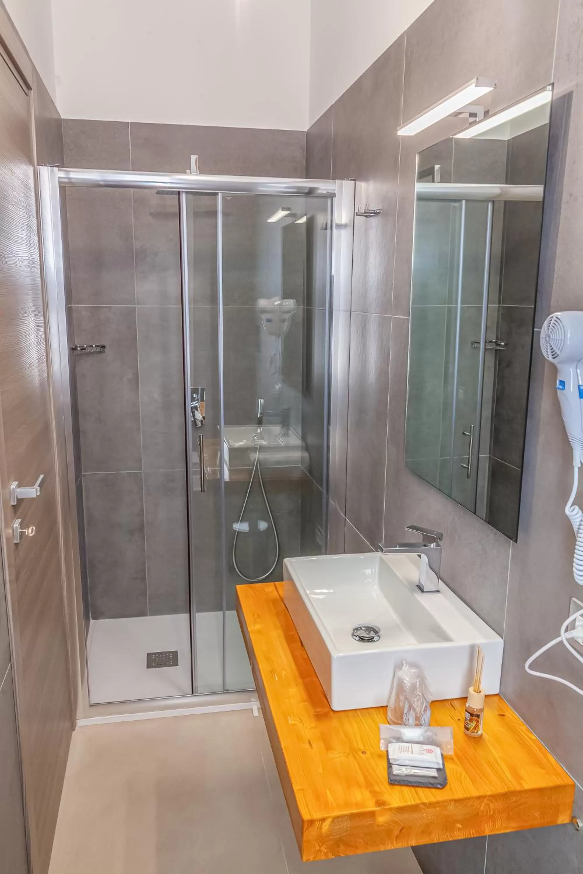 Bathroom in Isgrò Rooms