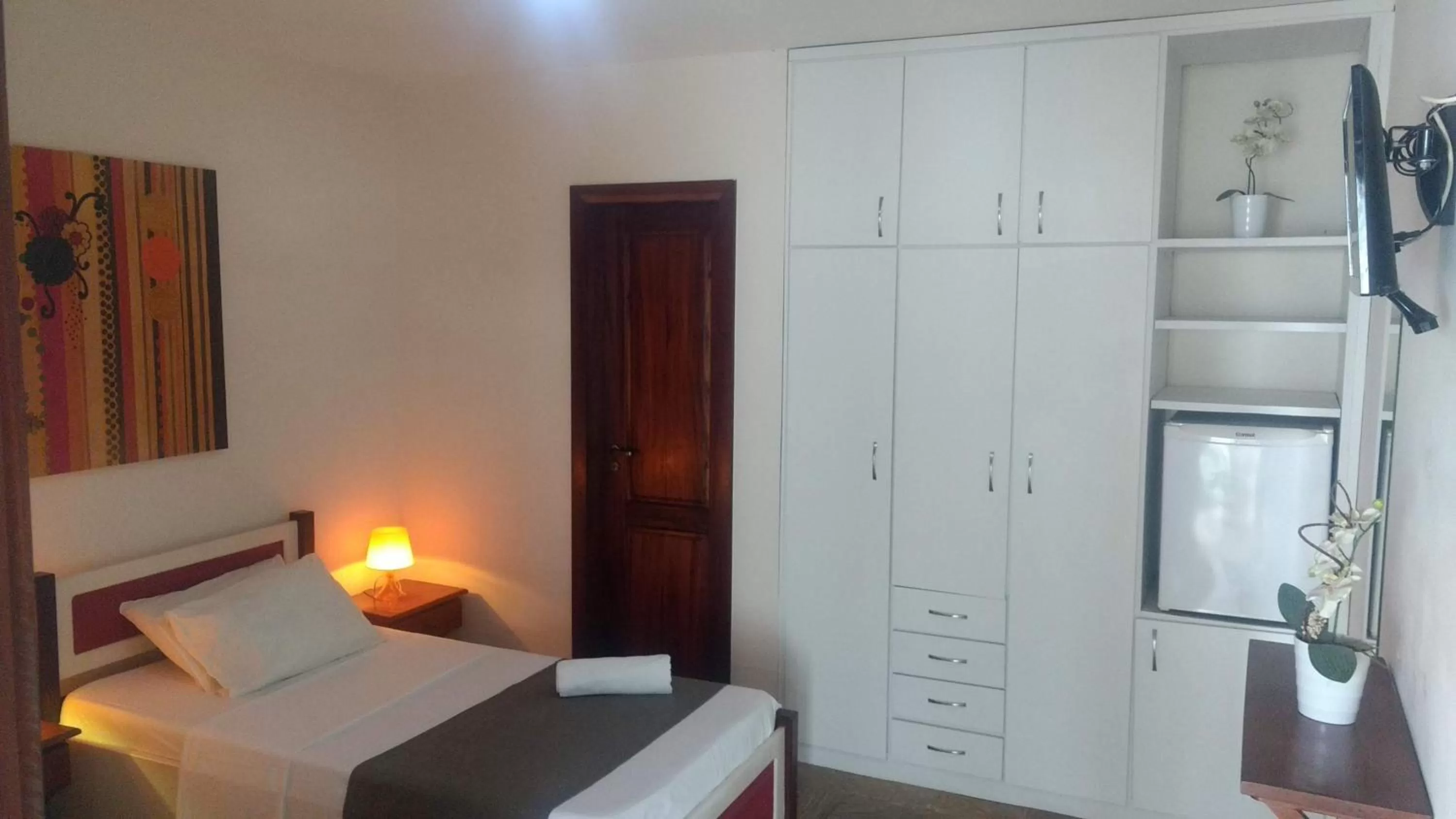 Bed in Hotel Pousada Salvador Paradise