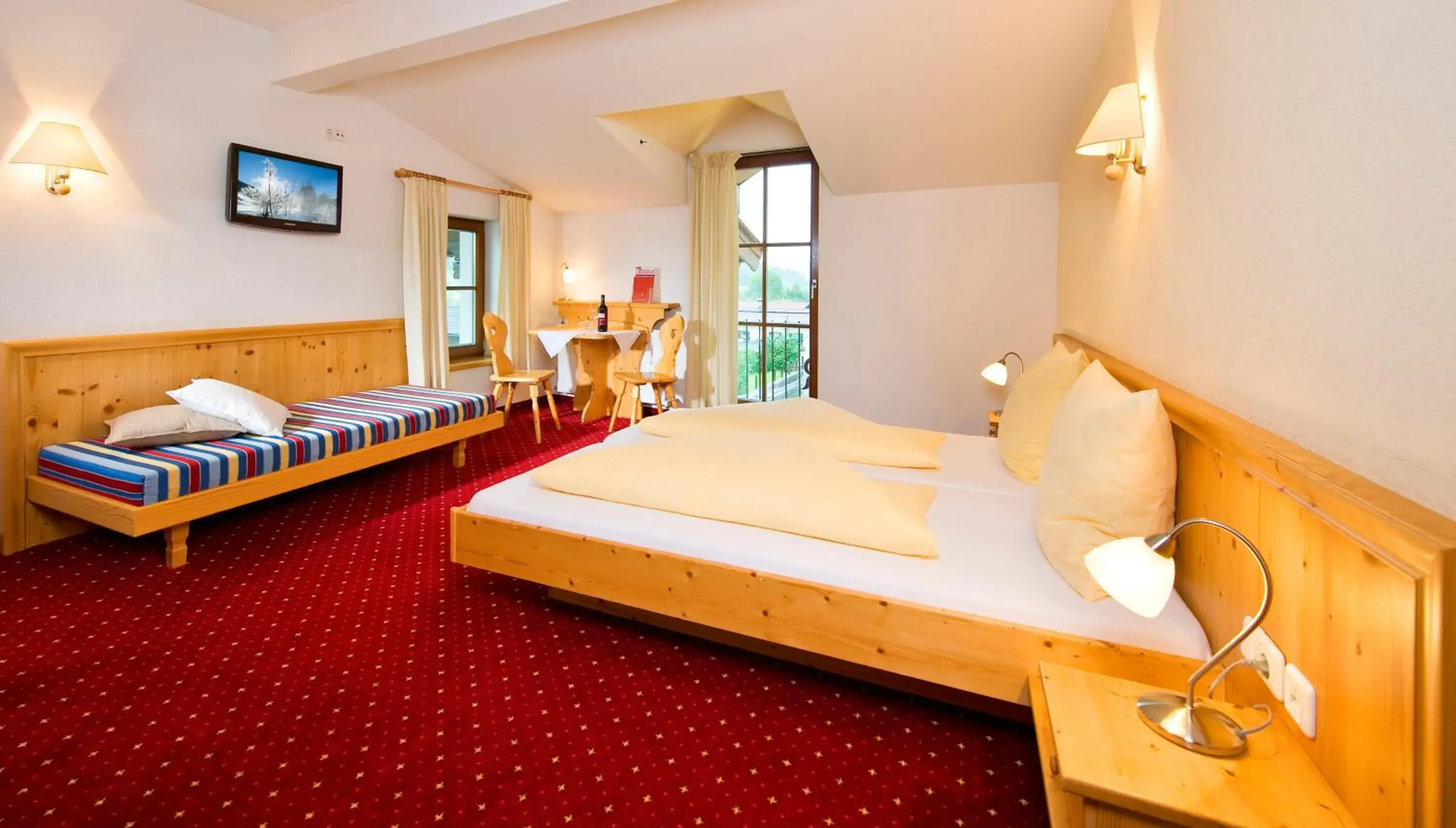 Photo of the whole room, Bed in Hotel Reitlwirt