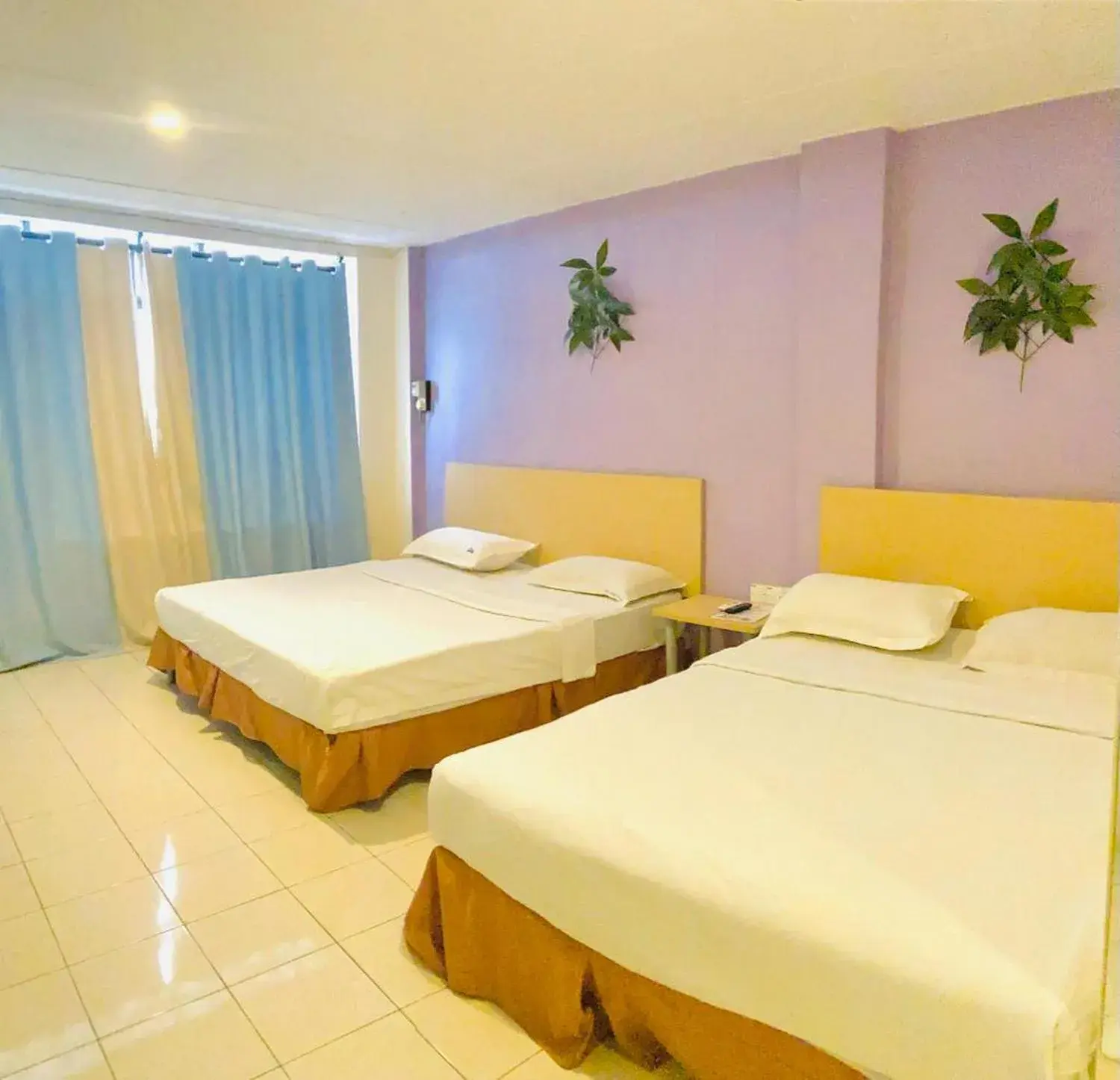 Bed in Sri Indar Hotel