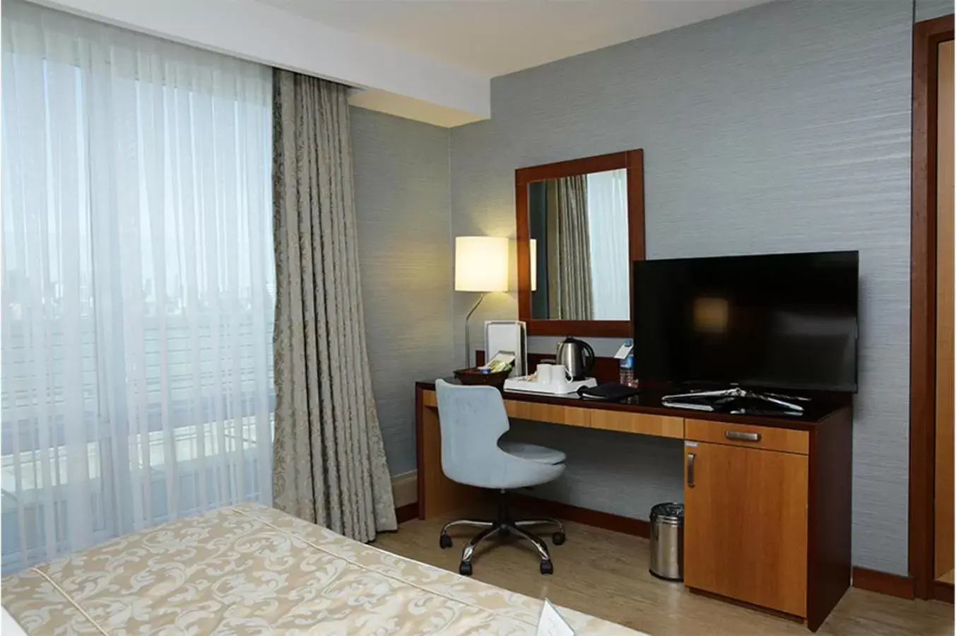 Photo of the whole room, TV/Entertainment Center in Byotell Hotel Istanbul