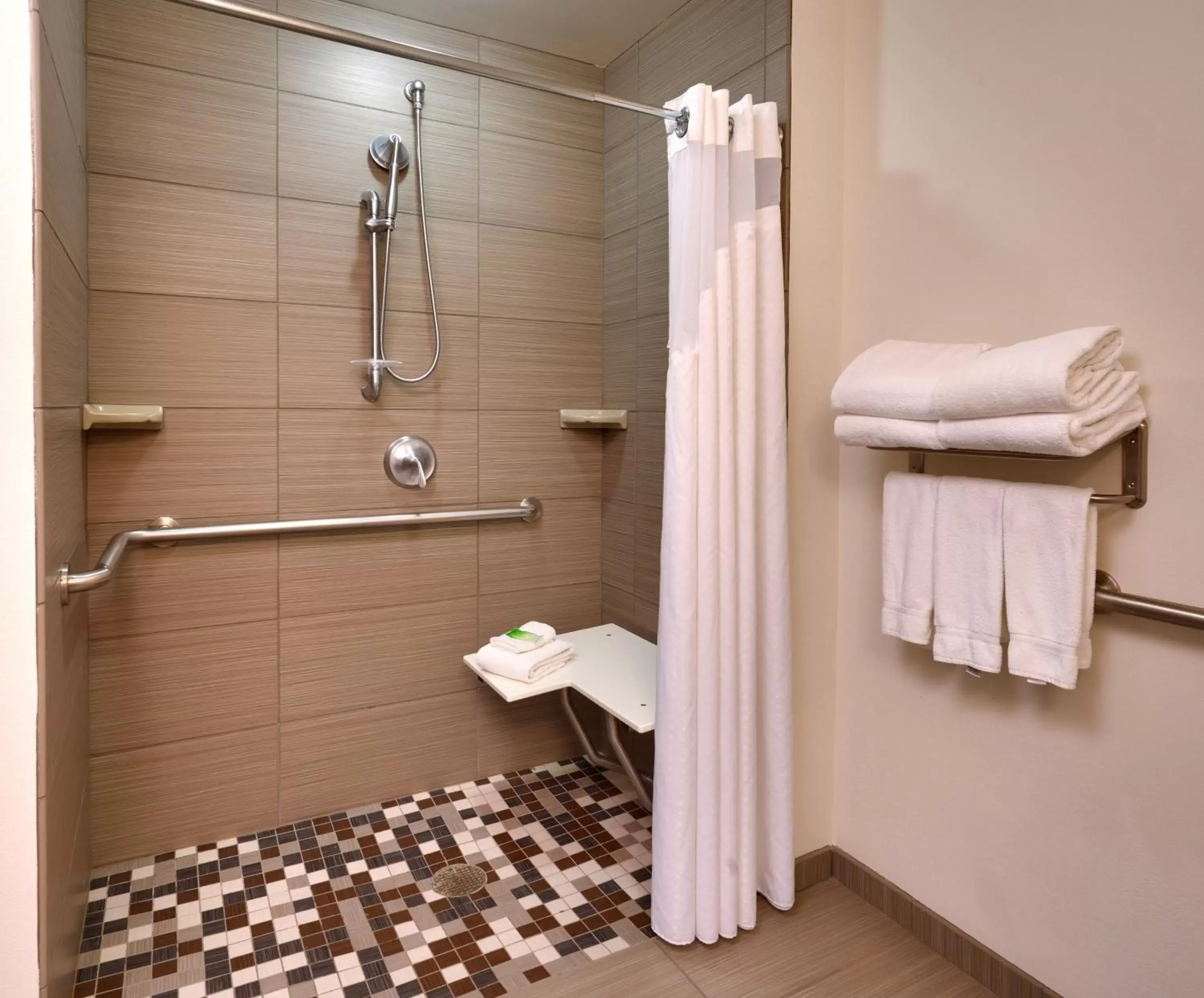 Bathroom in Holiday Inn Express & Suites Overland Park, an IHG Hotel