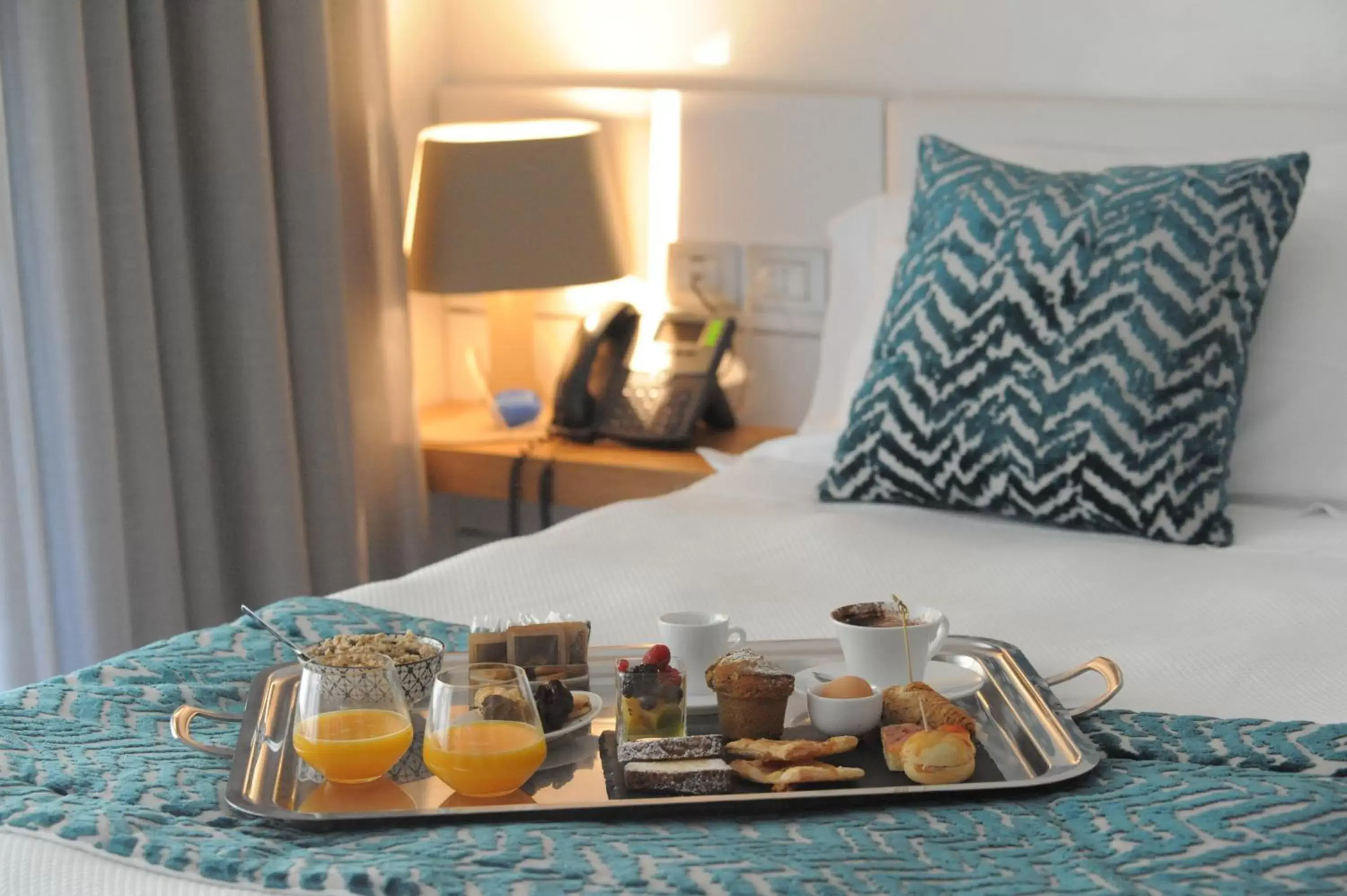 Bed in Caportigia Boutique Hotel