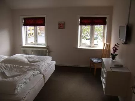Family Room with Shared Bathroom (2 Adults + 2 Children) in Det Lille Hotel