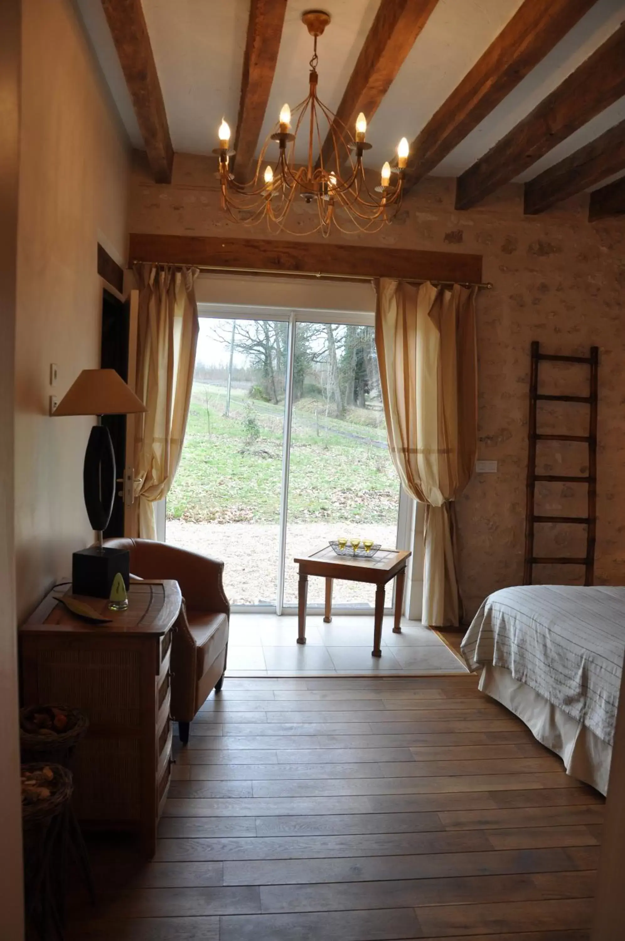 Bedroom in Les Pierres D'aurèle Chambres d'Hôtes