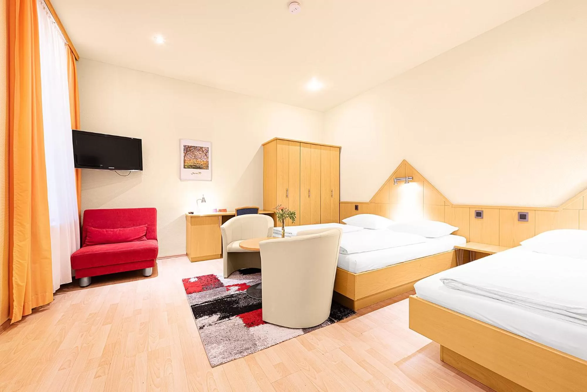 Living room, Bed in Hotel-Pension Wild