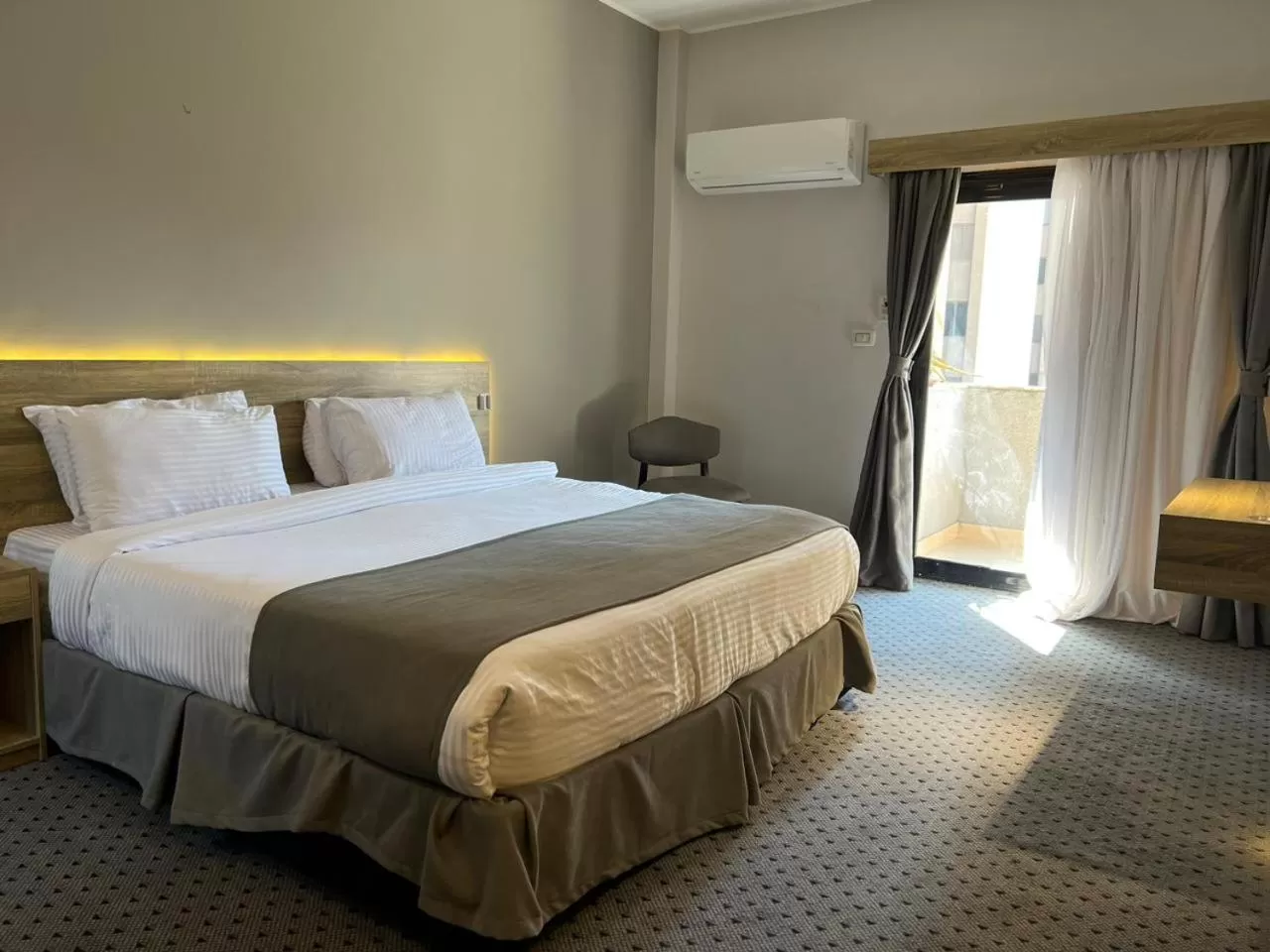 Bed in Atlas International Hotels