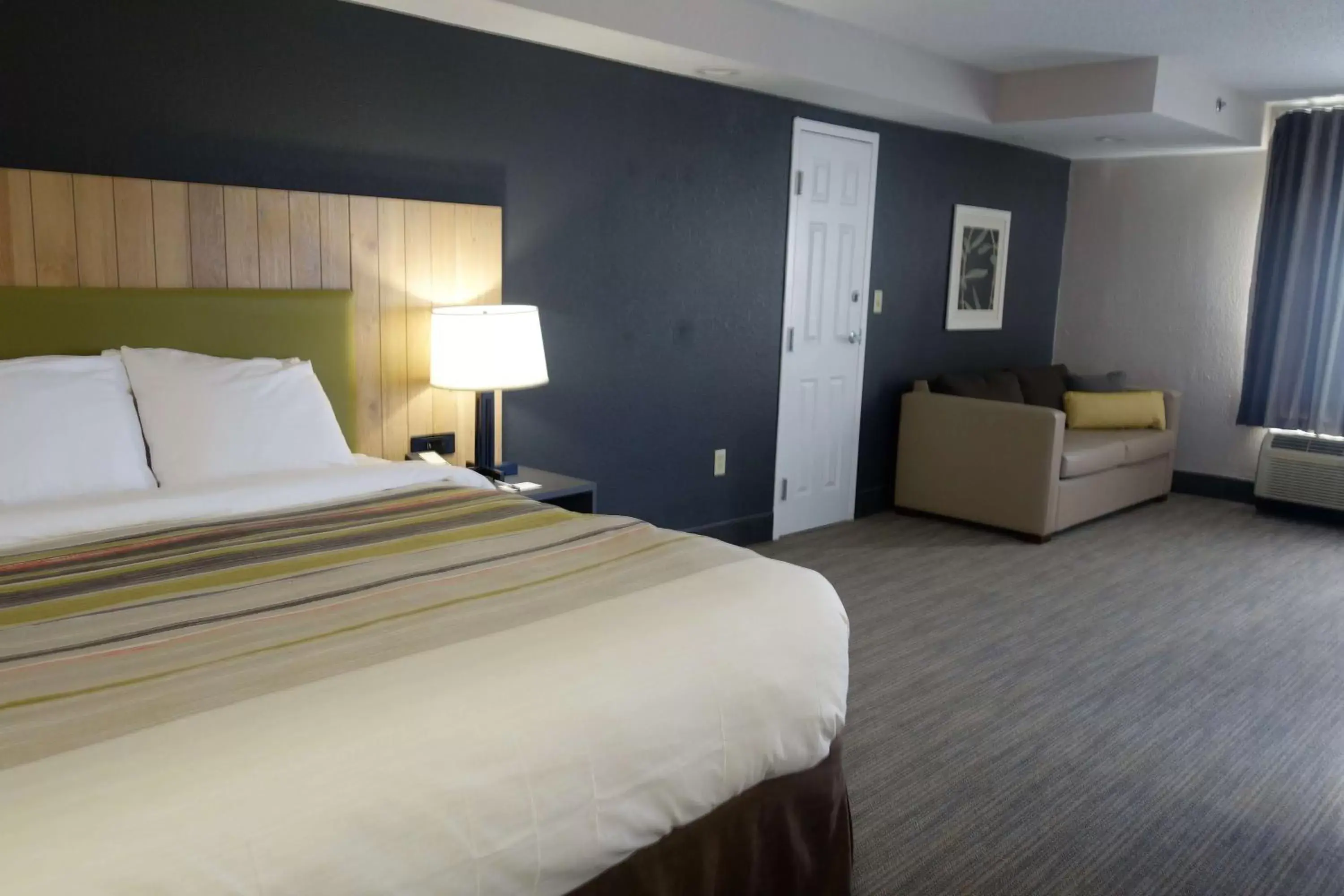 Photo of the whole room, Bed in Country Inn & Suites by Radisson, Pigeon Forge South, TN