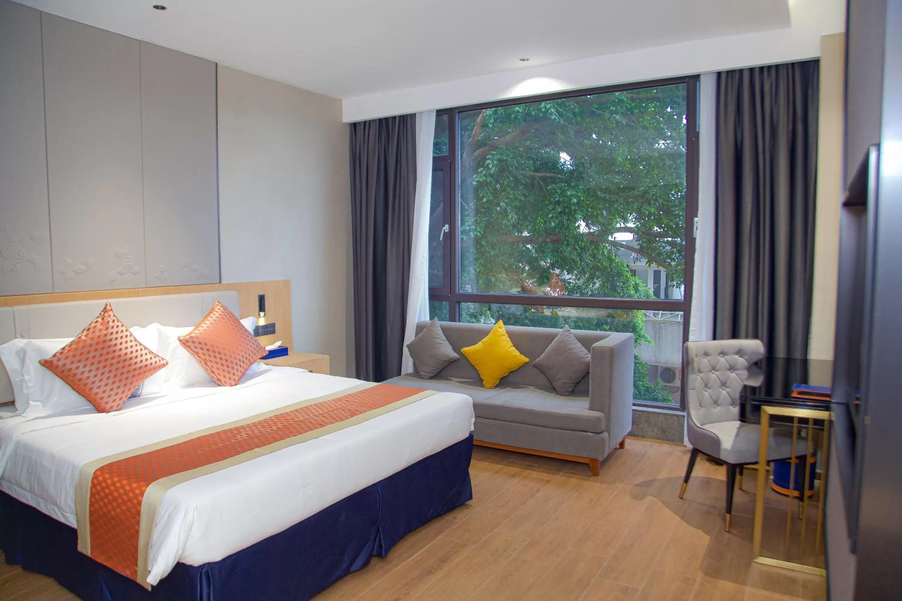 Photo of the whole room in Hôtel FAMILLE MONDIALE