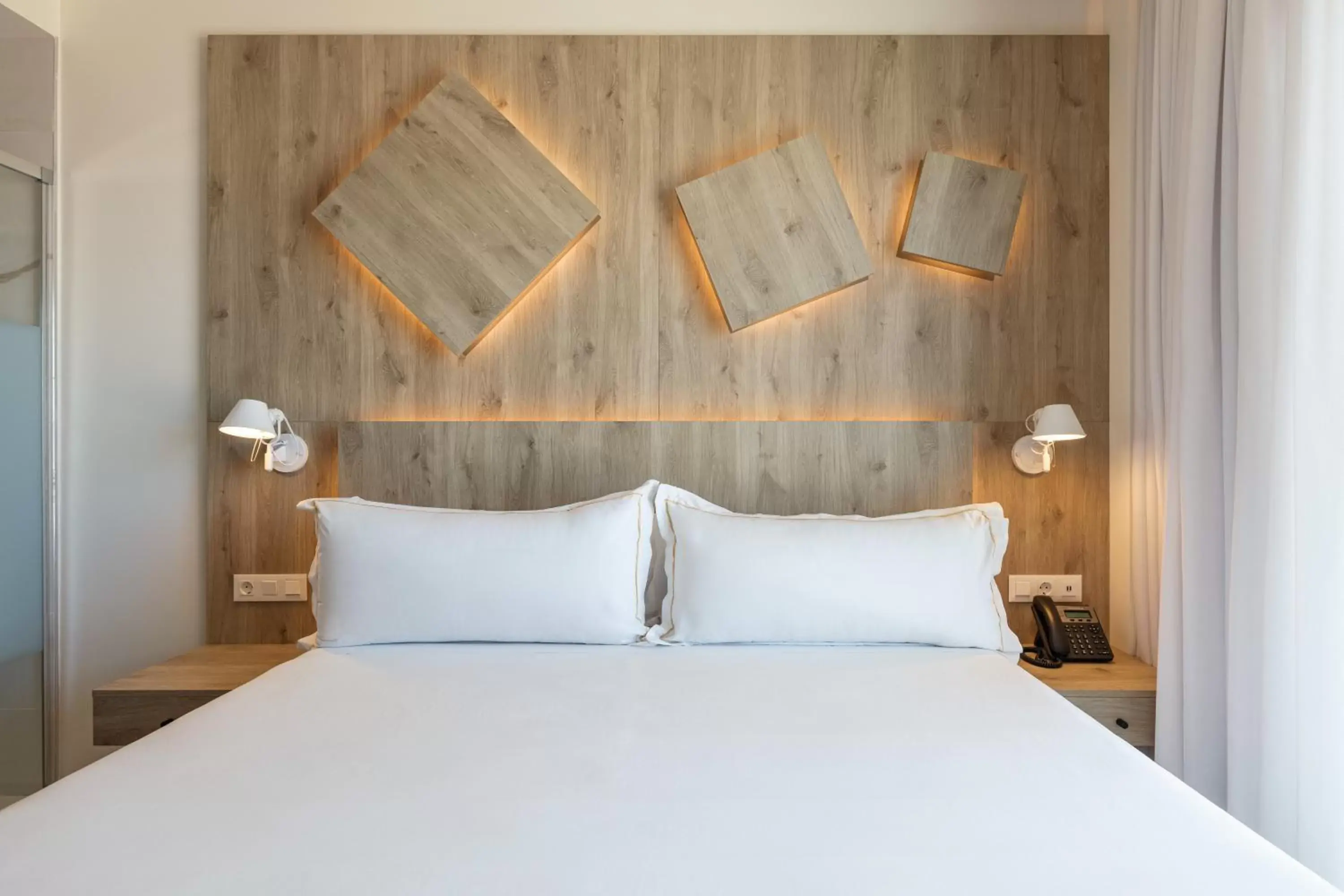 Bed in Senator Gandia Spa Hotel