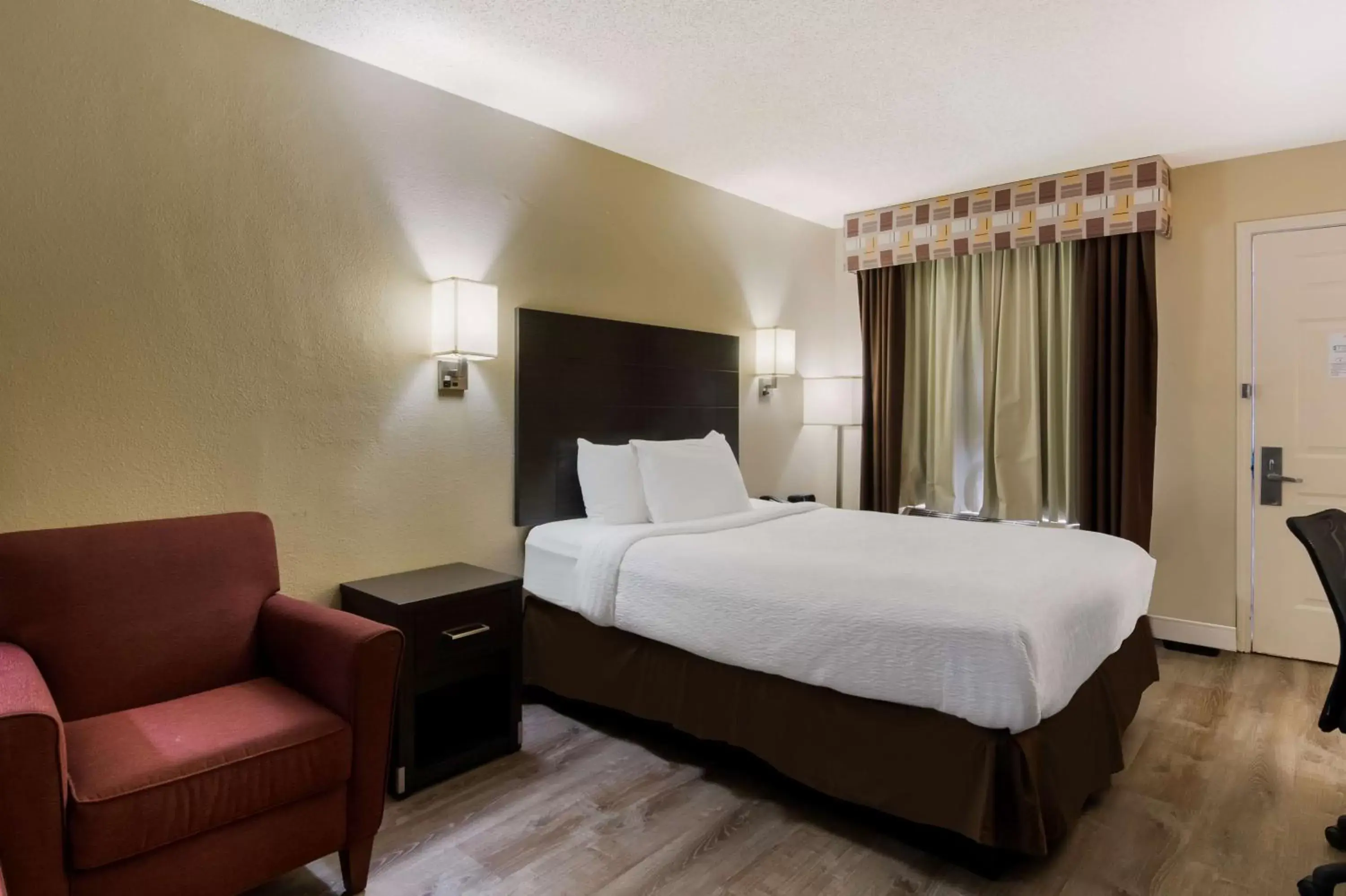 Bedroom, Bed in SureStay Plus Hotel by Best Western Jackson